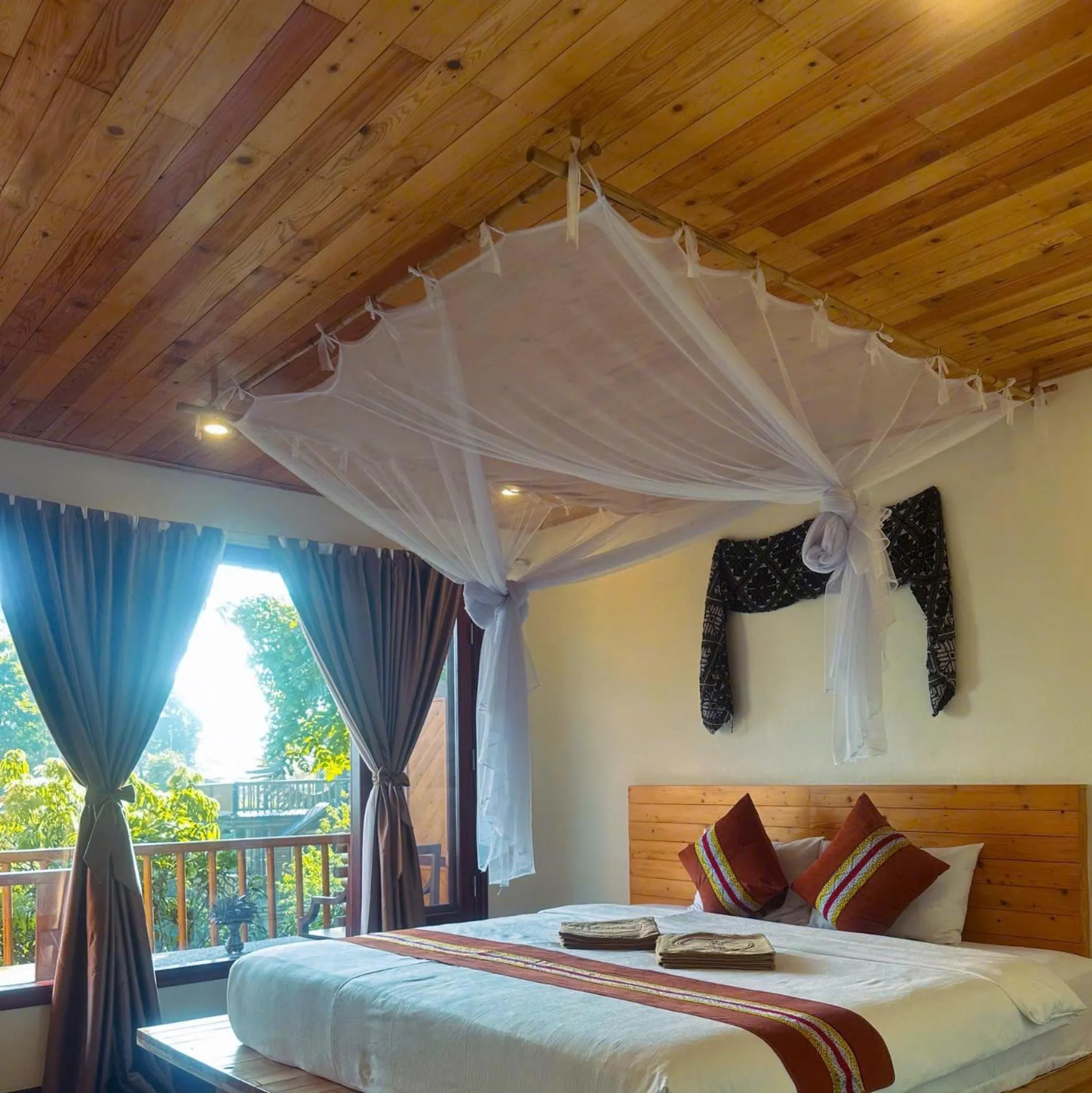 Bed in Pu Luong Jungle Lodge