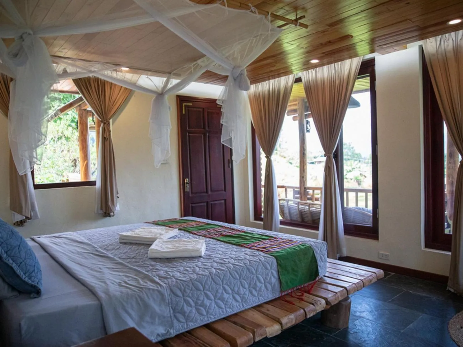 Bed in Pu Luong Jungle Lodge