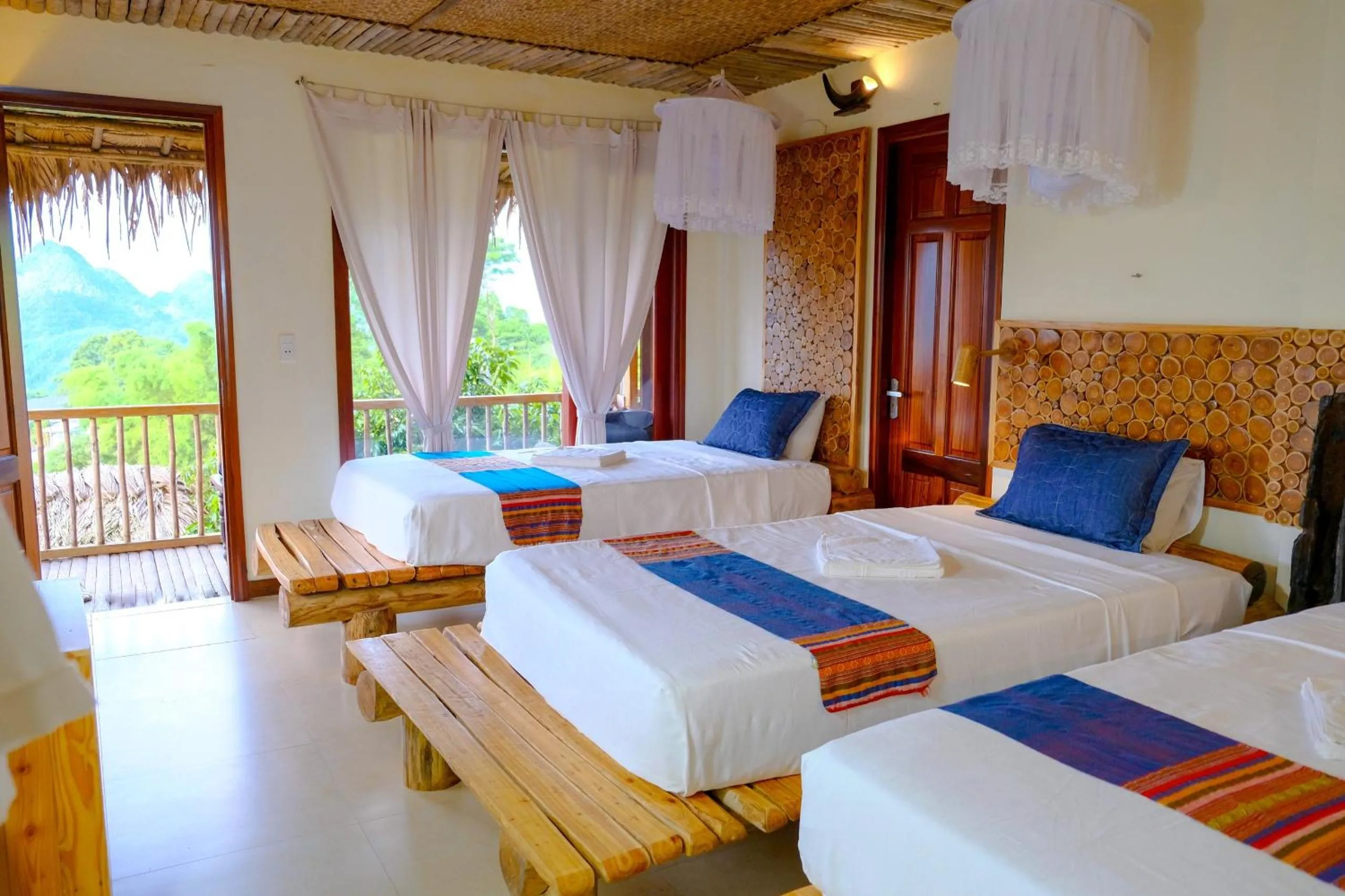 Bed in Pu Luong Jungle Lodge