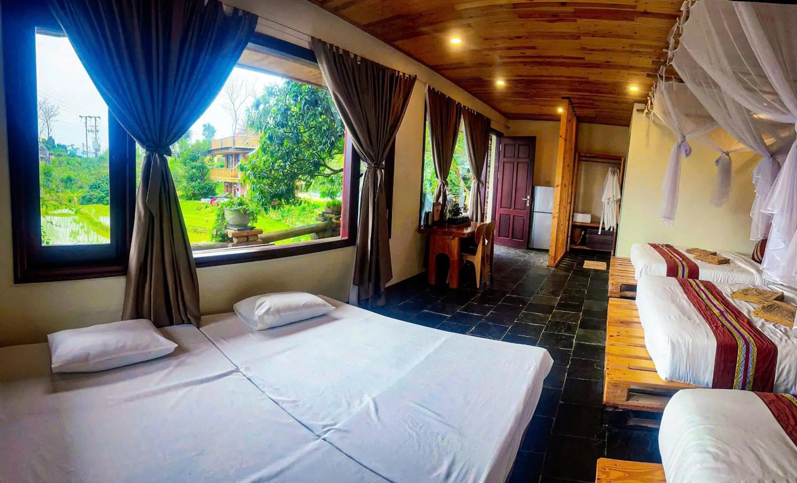 Photo of the whole room, Bed in Pu Luong Jungle Lodge