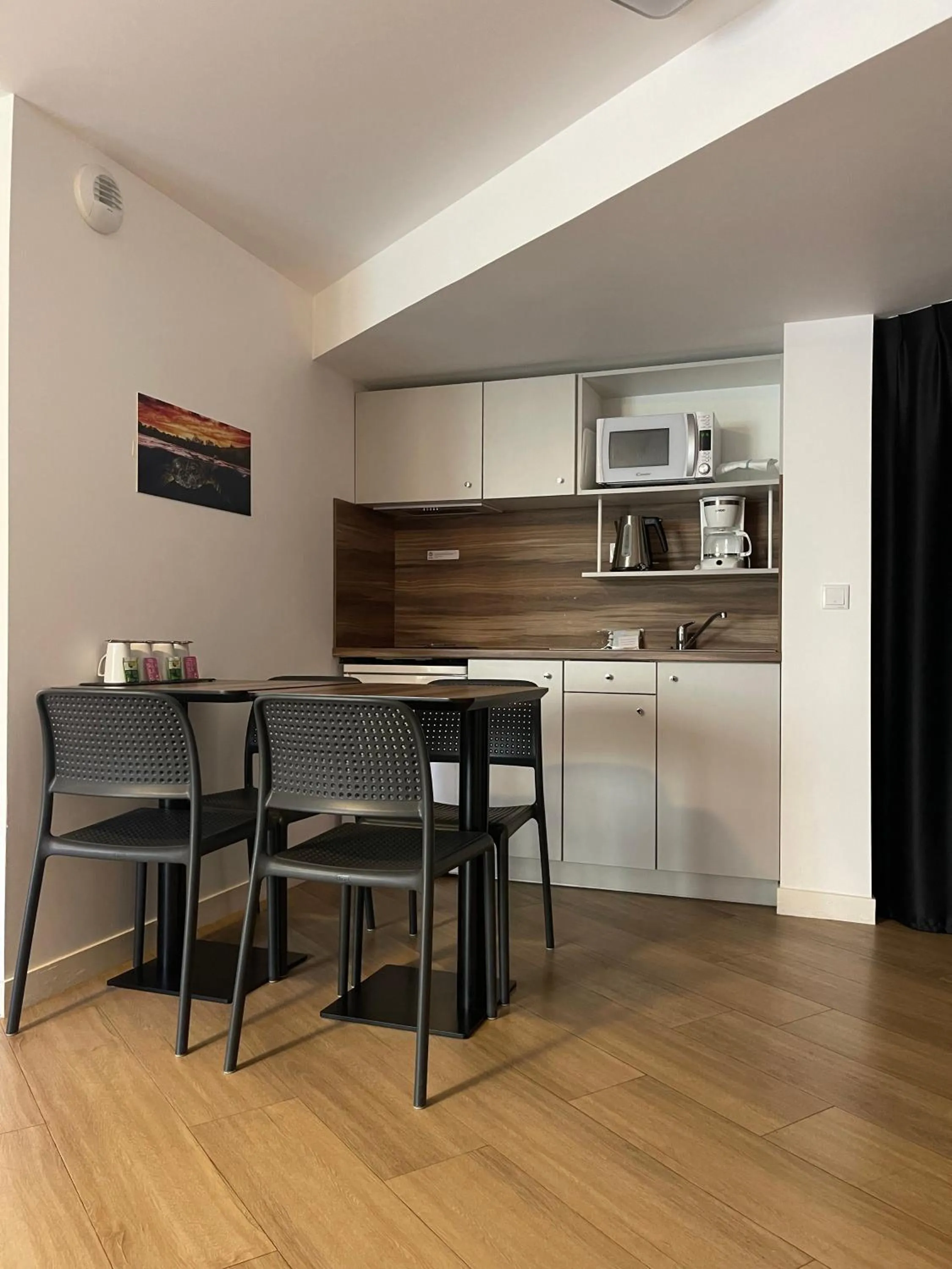 Kitchen or kitchenette in ATHOME RESIDENCE ET SPA