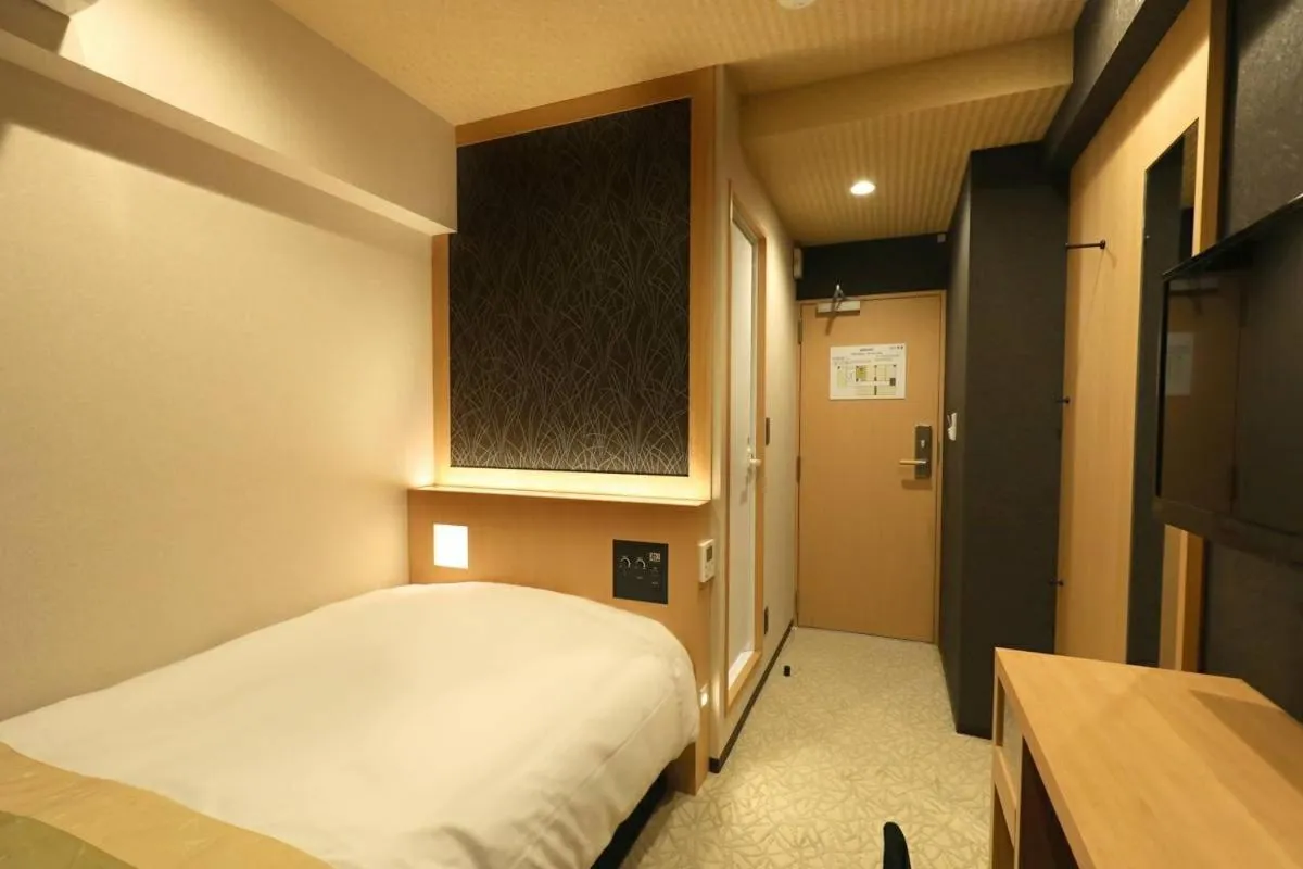 Bed in Hotel Matsunoi