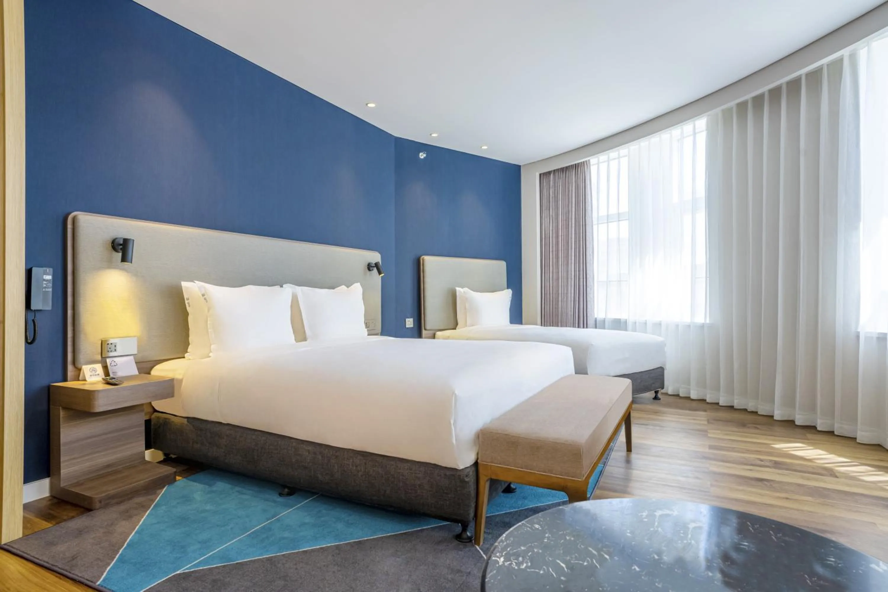 Photo of the whole room, Bed in Holiday Inn Express Urumqi Station by IHG
