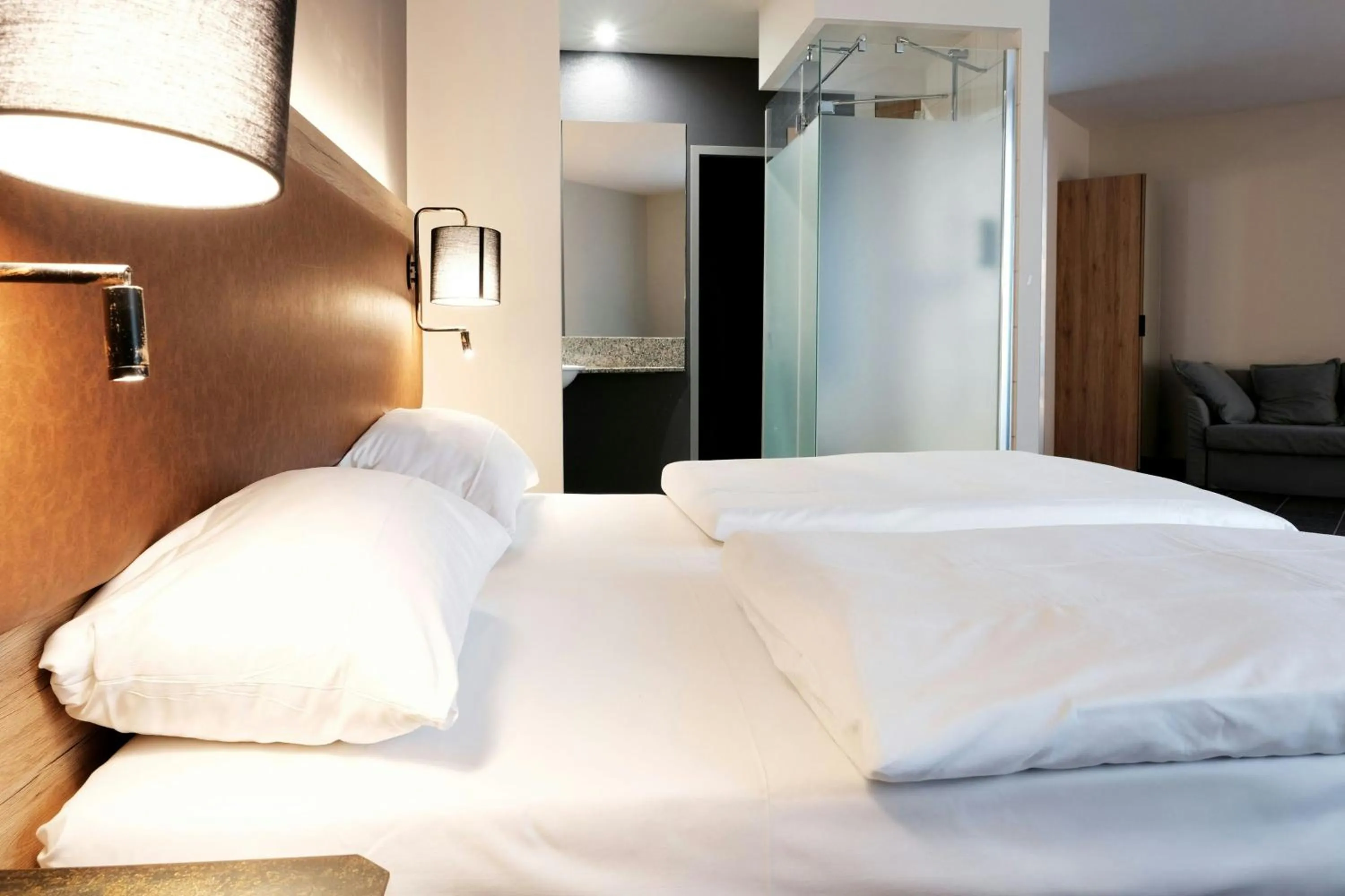 Photo of the whole room, Bed in Four Points Flex by Sheraton Ratingen Düsseldorf Airport