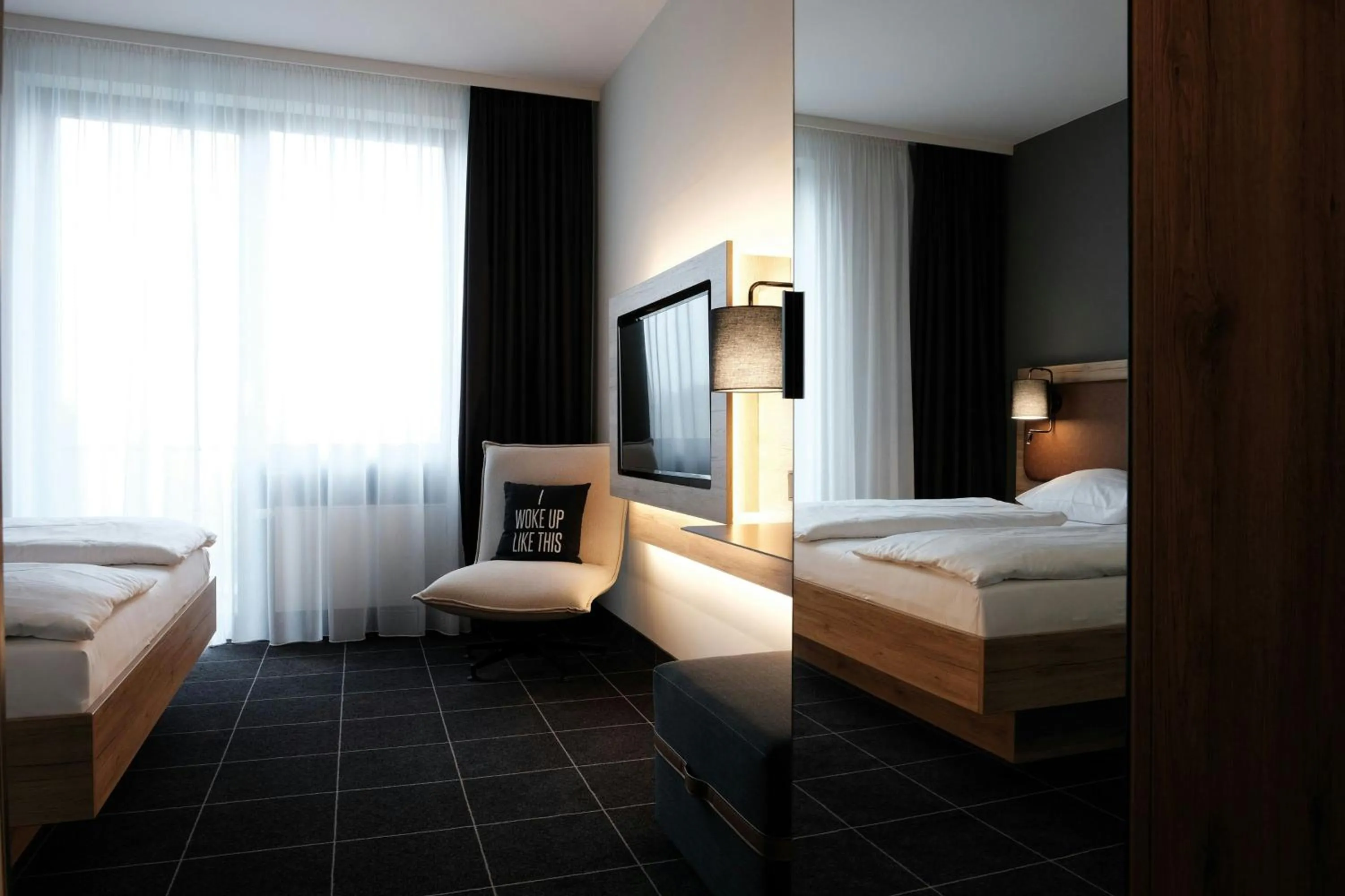 Photo of the whole room, Bed in Four Points Flex by Sheraton Ratingen Düsseldorf Airport