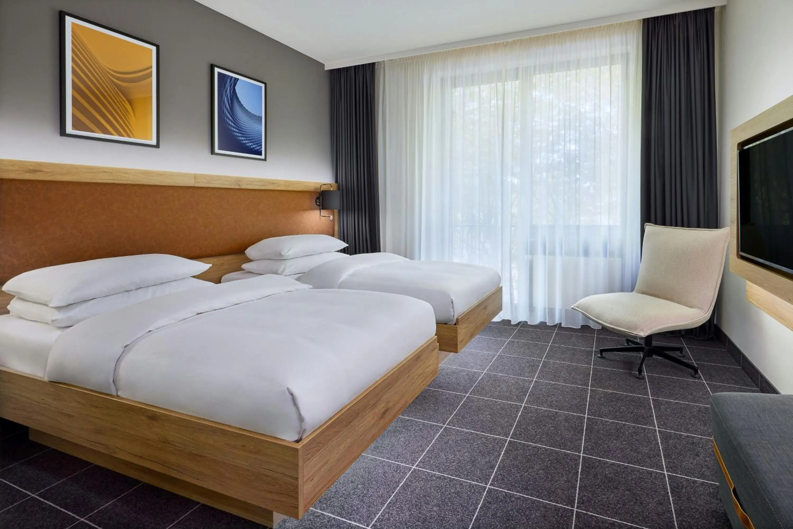 Photo of the whole room, Bed in Four Points Flex by Sheraton Ratingen Düsseldorf Airport