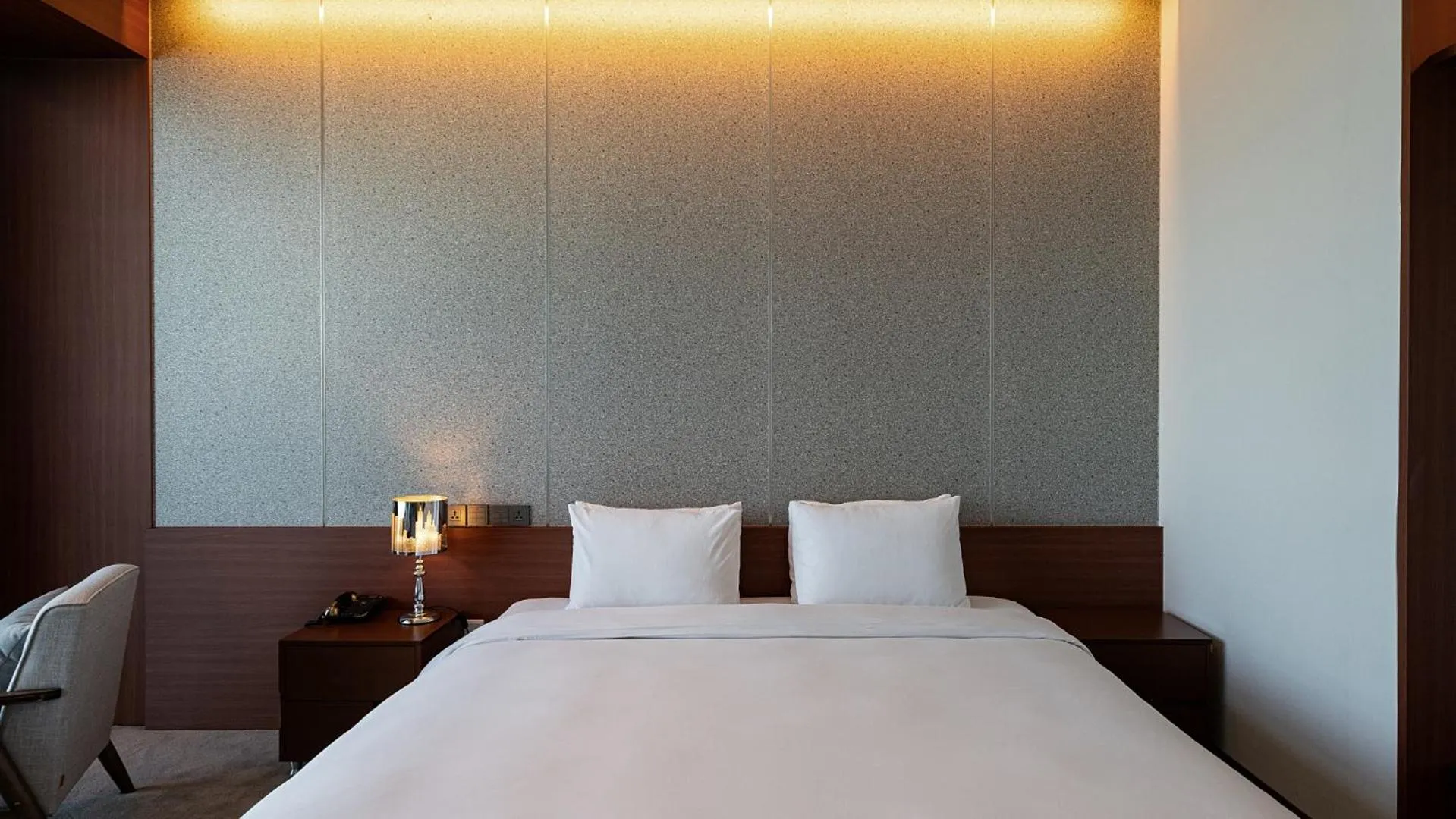 Bed in Hotel JCS Yeosu