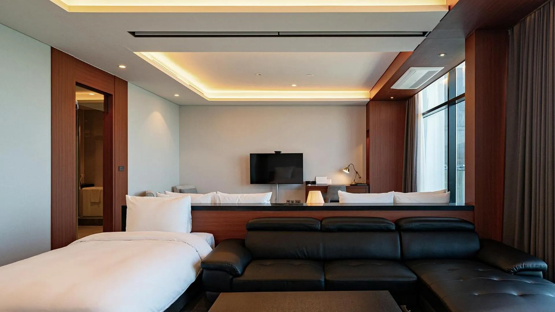 Bed in Hotel JCS Yeosu