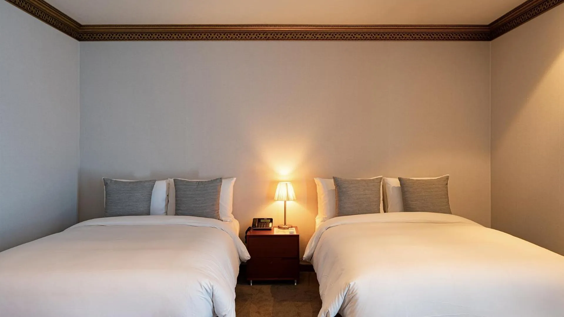 Bed in Hotel JCS Yeosu