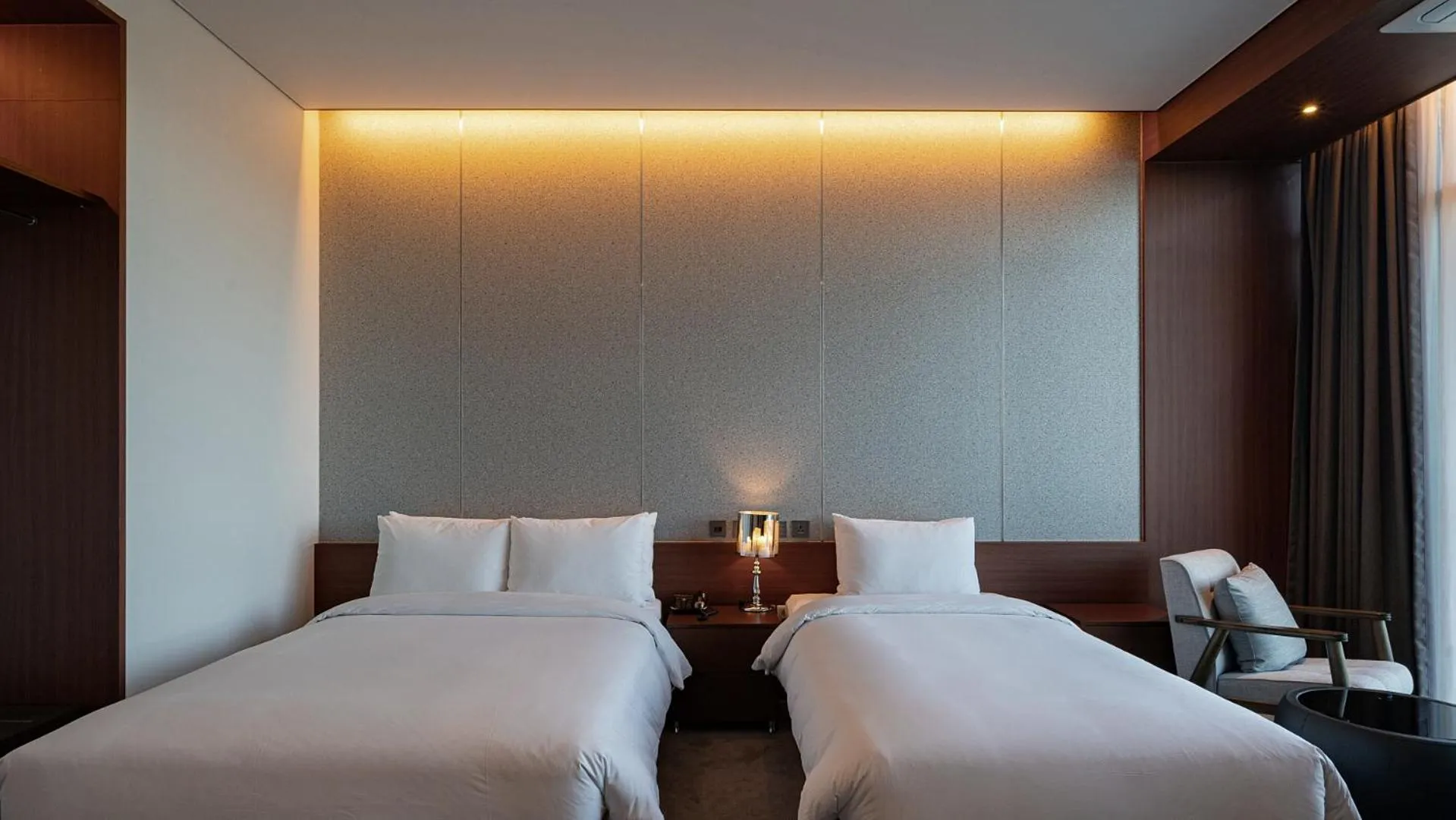 Bed in Hotel JCS Yeosu