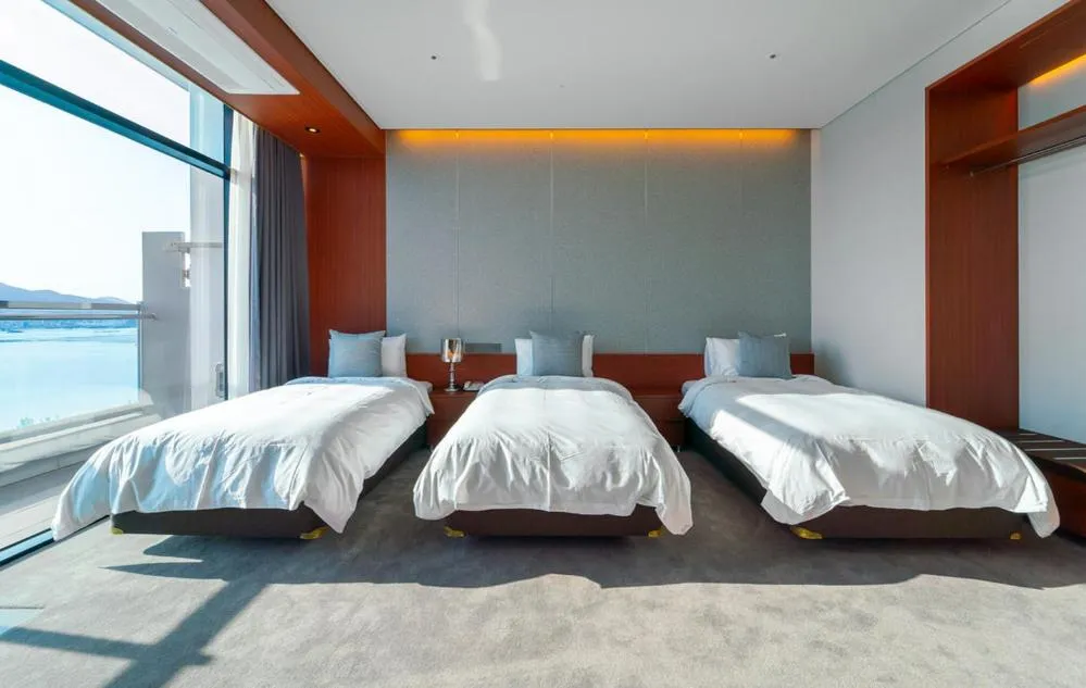 Bed in Hotel JCS Yeosu