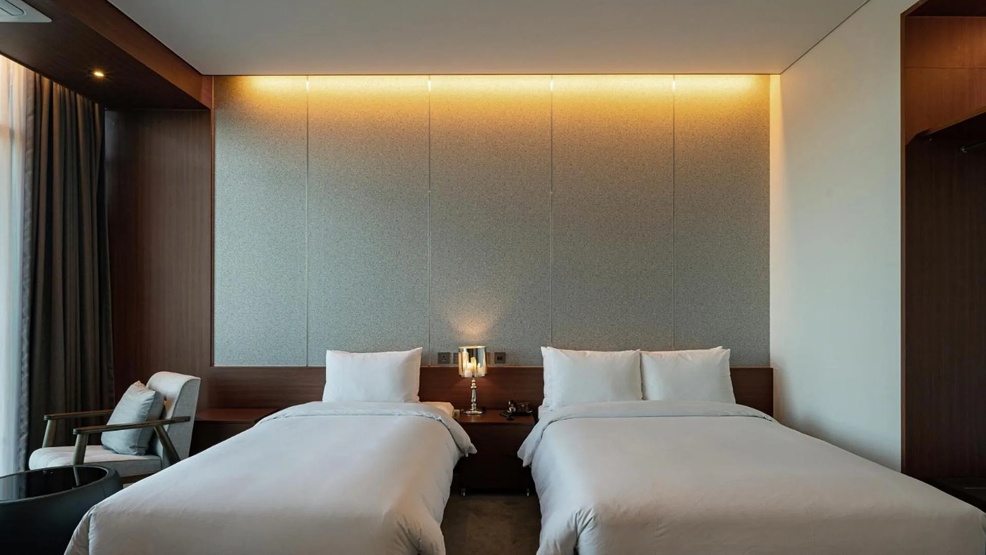 Bed in Hotel JCS Yeosu