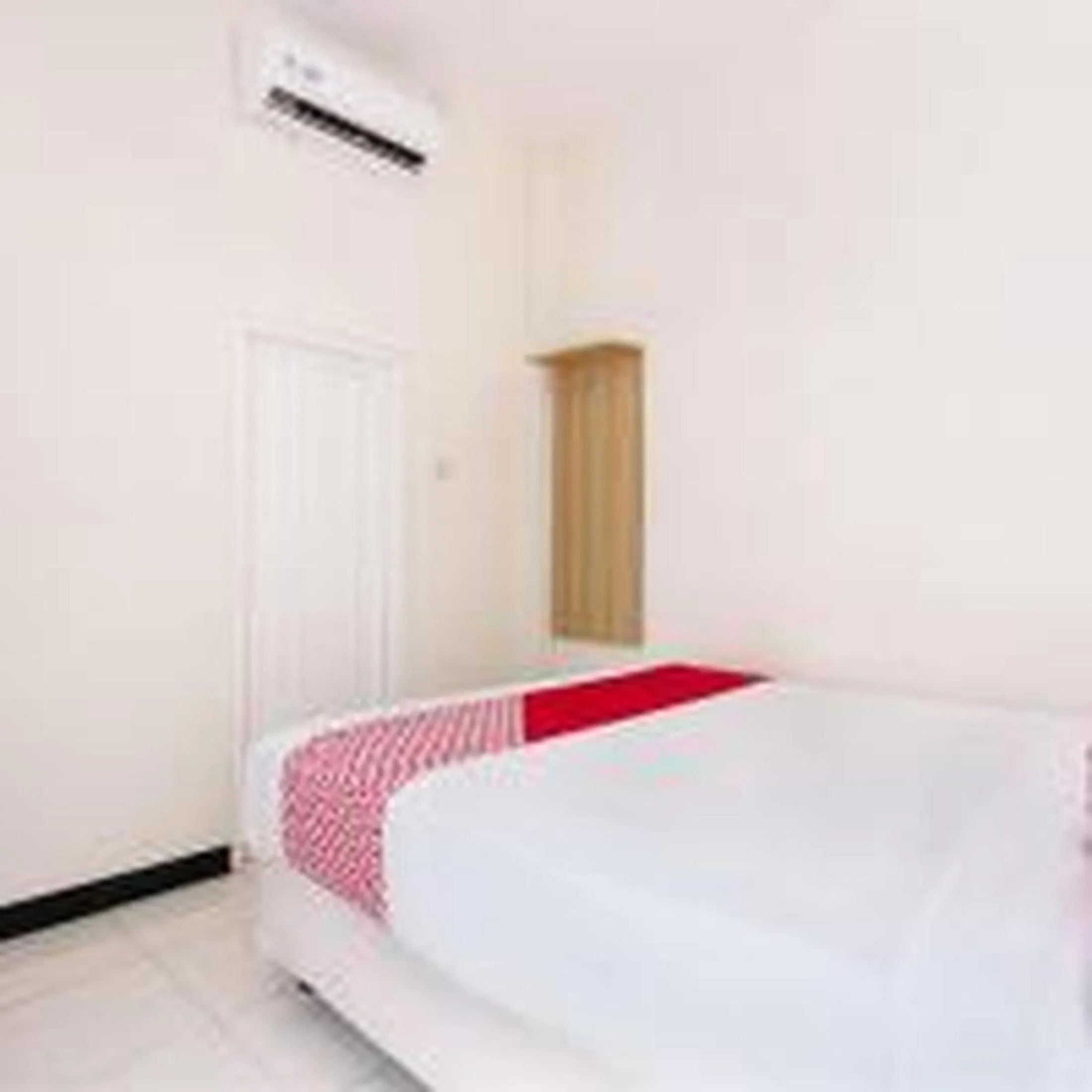 Bed in Hotel O Cozy Residence Syariah