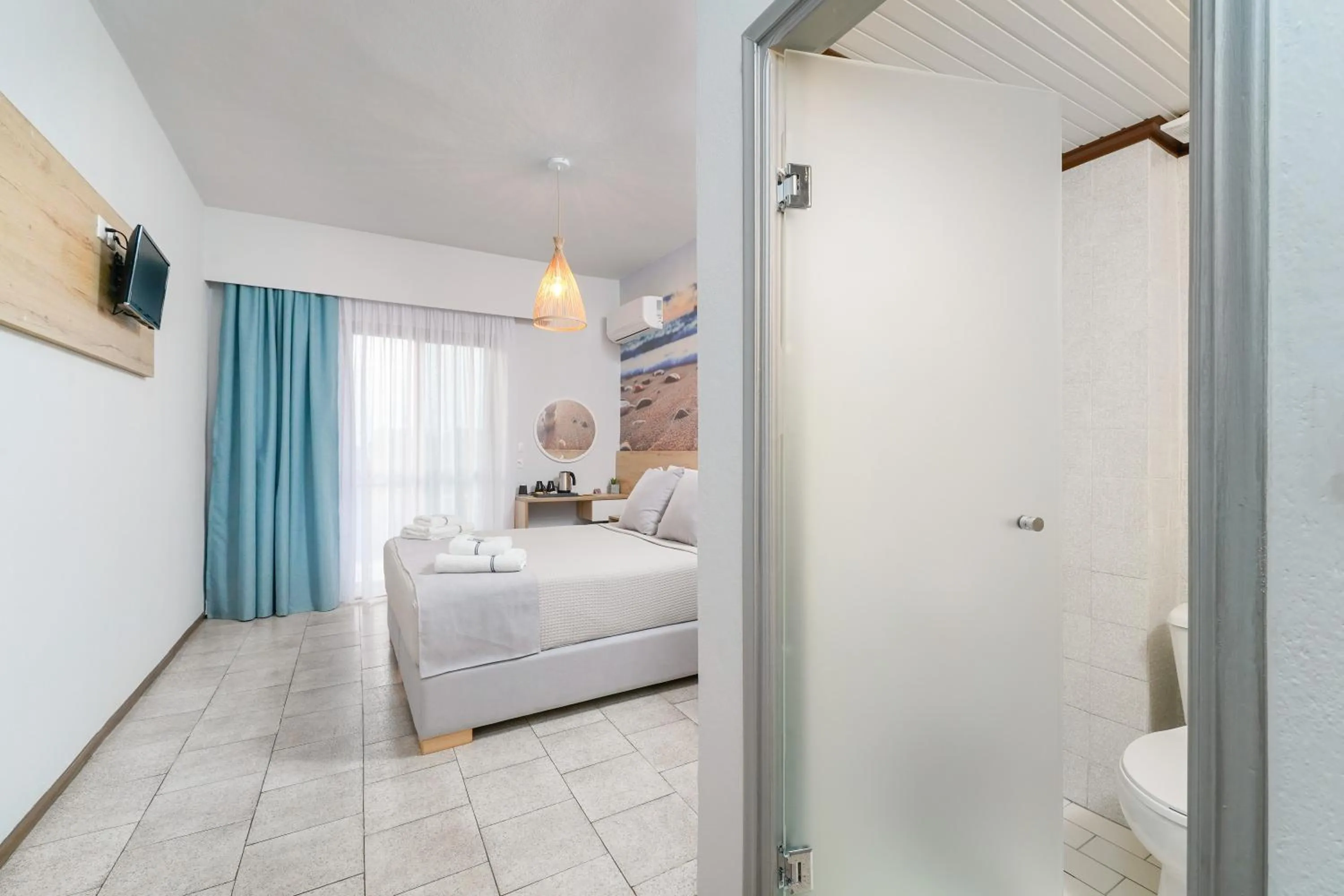 Bed in Nefeli Fresh Hotel by Del Mare