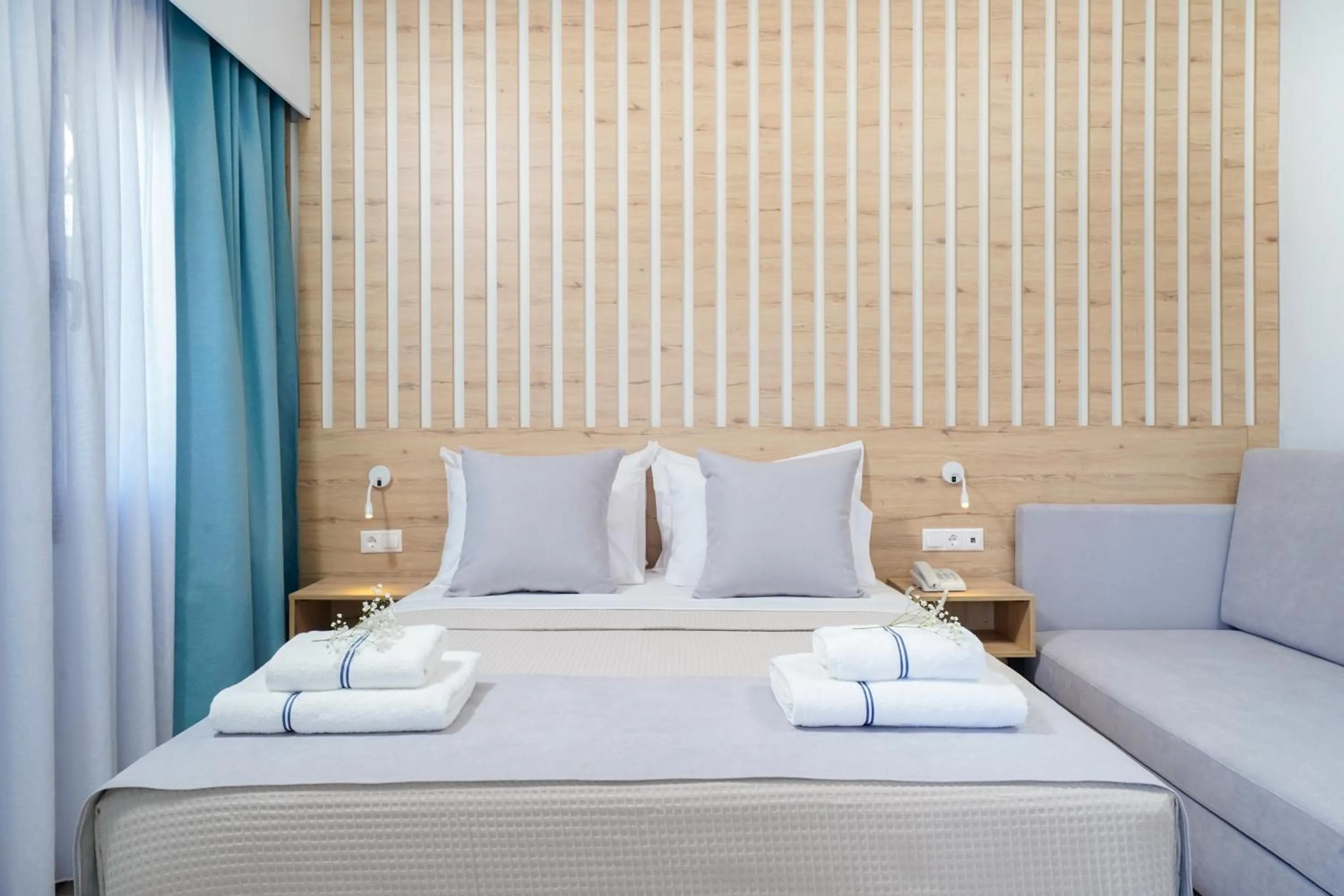 Bed in Nefeli Fresh Hotel by Del Mare