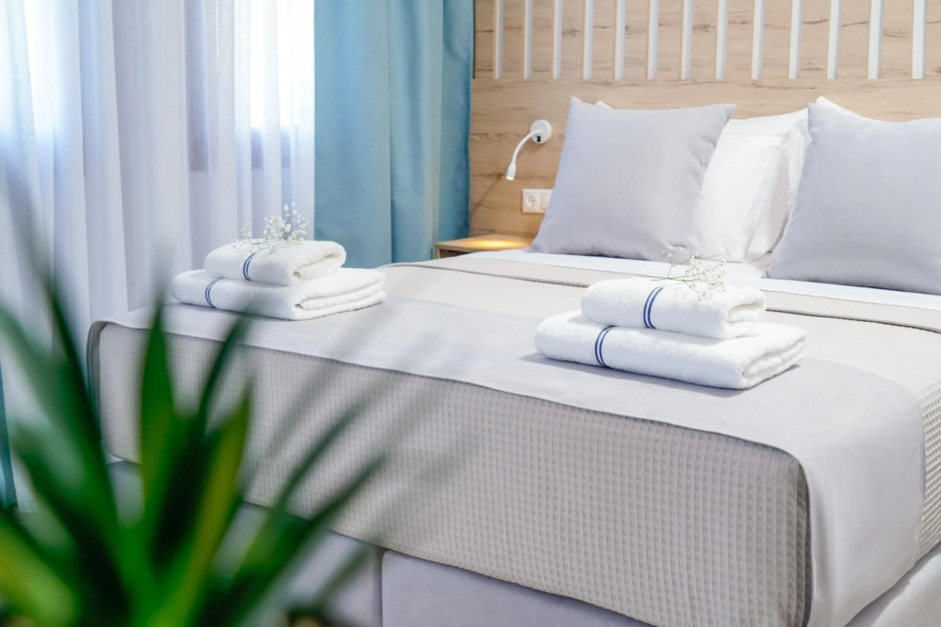 Bed in Nefeli Fresh Hotel by Del Mare