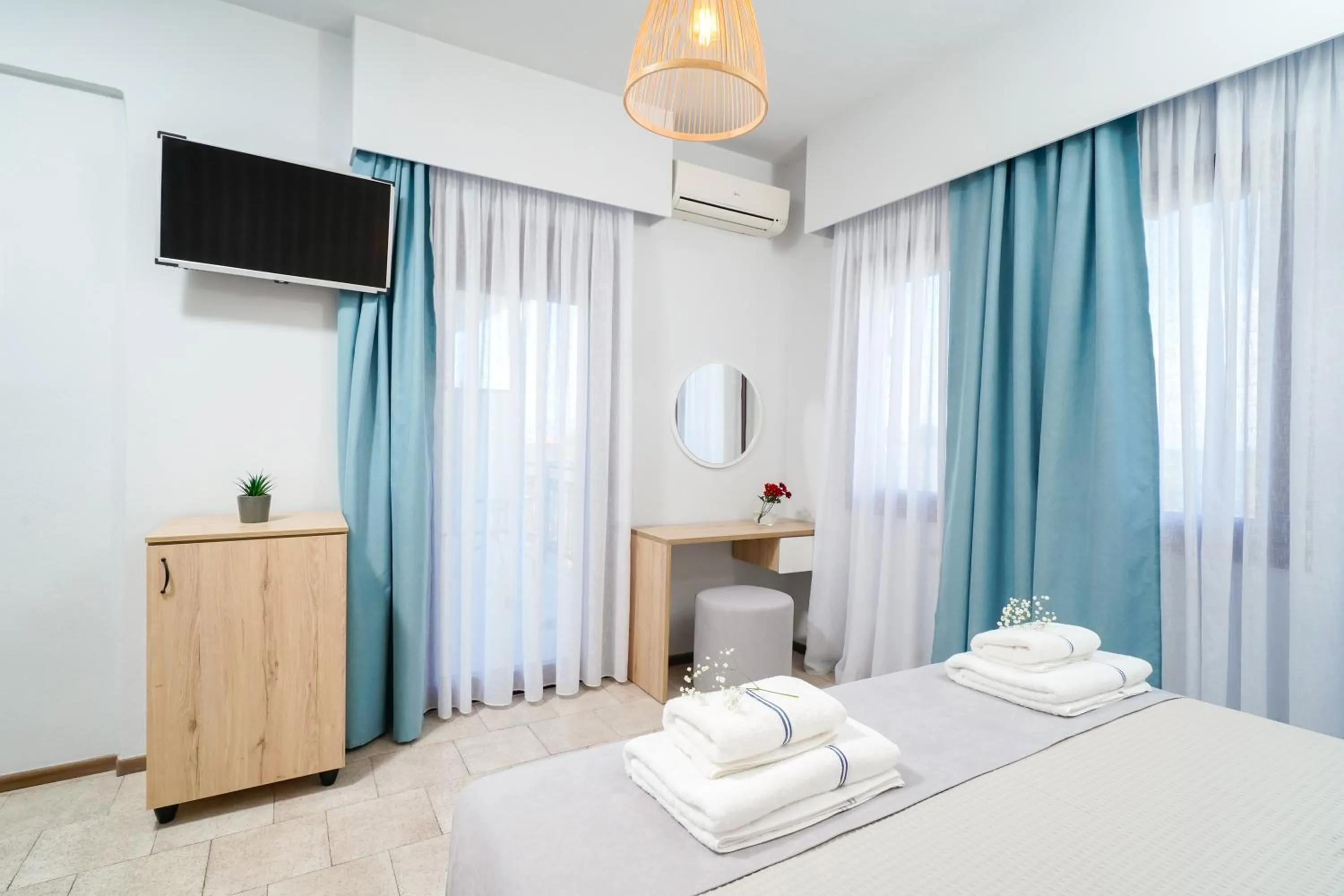 Bed in Nefeli Fresh Hotel by Del Mare