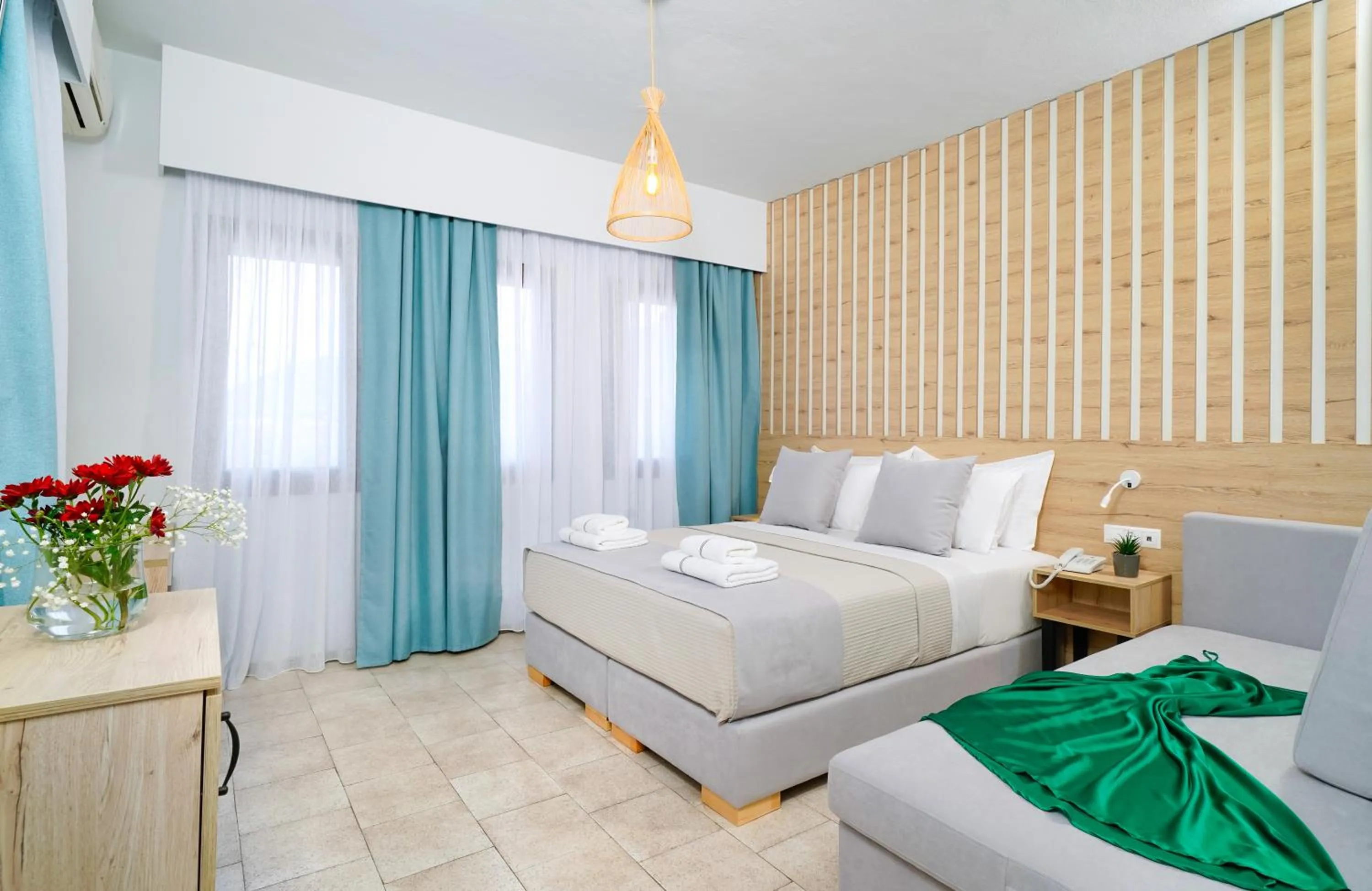 Bed in Nefeli Fresh Hotel by Del Mare