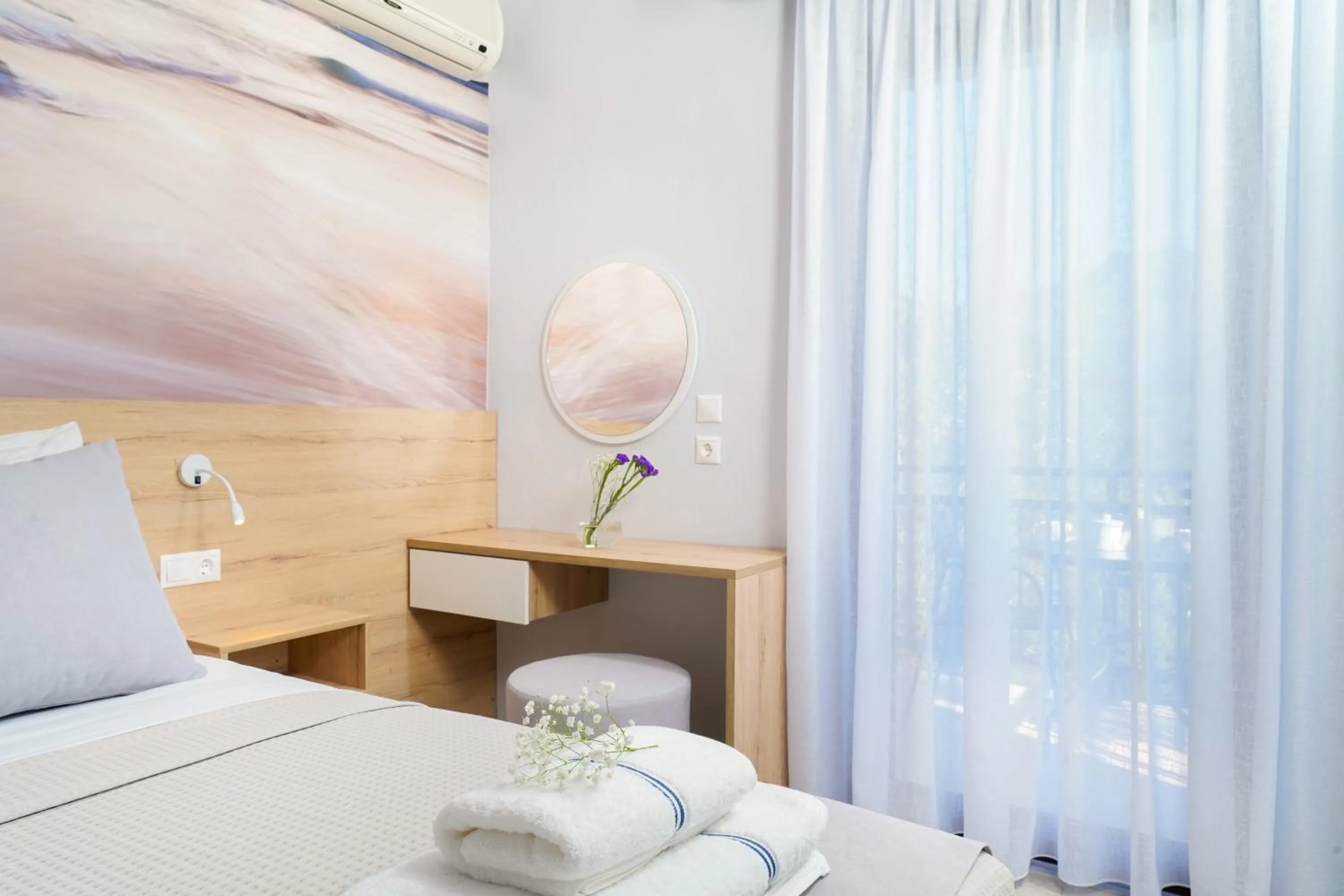 Bed in Nefeli Fresh Hotel by Del Mare