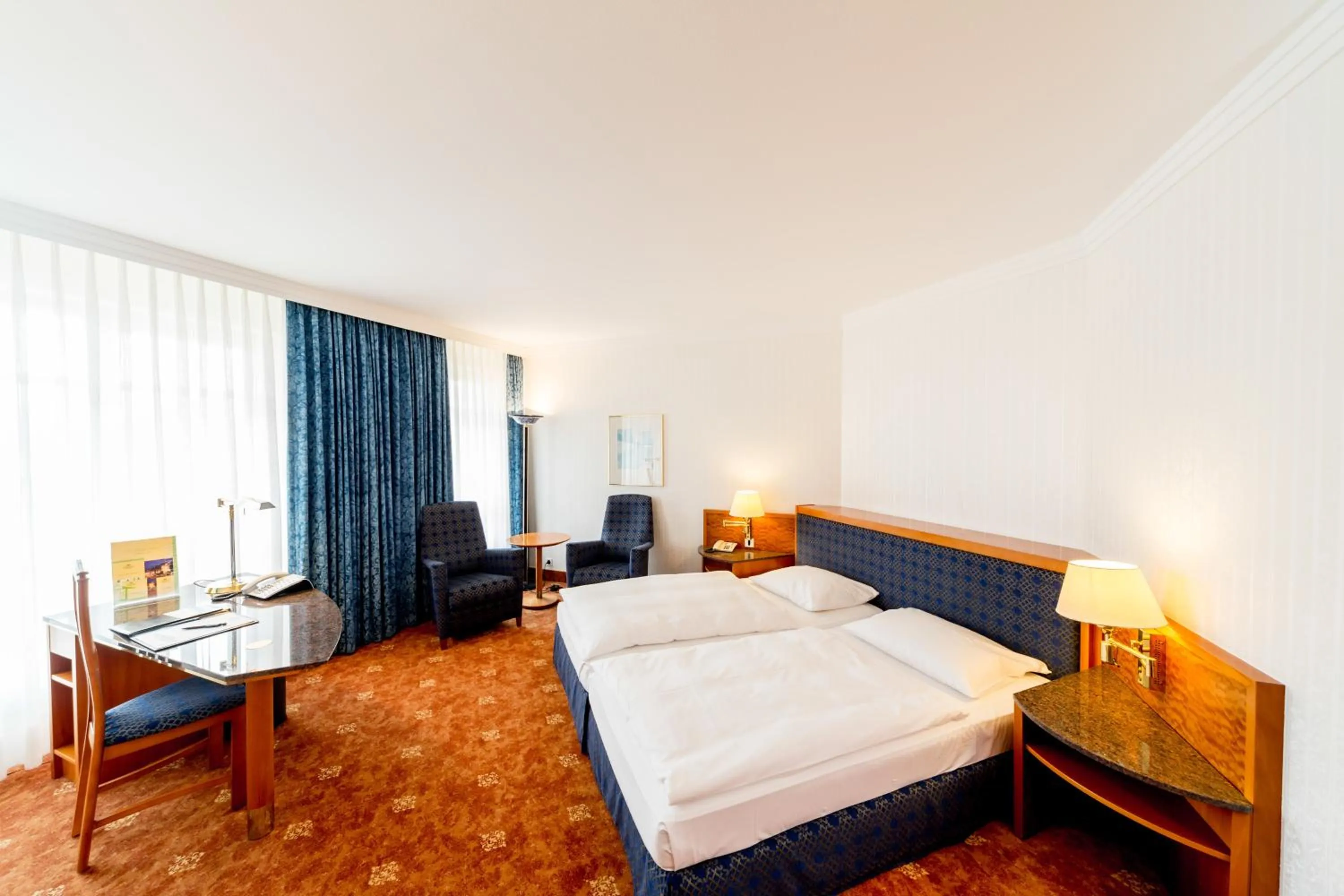 Photo of the whole room, Bed in Dorint Herrenkrug Parkhotel Magdeburg