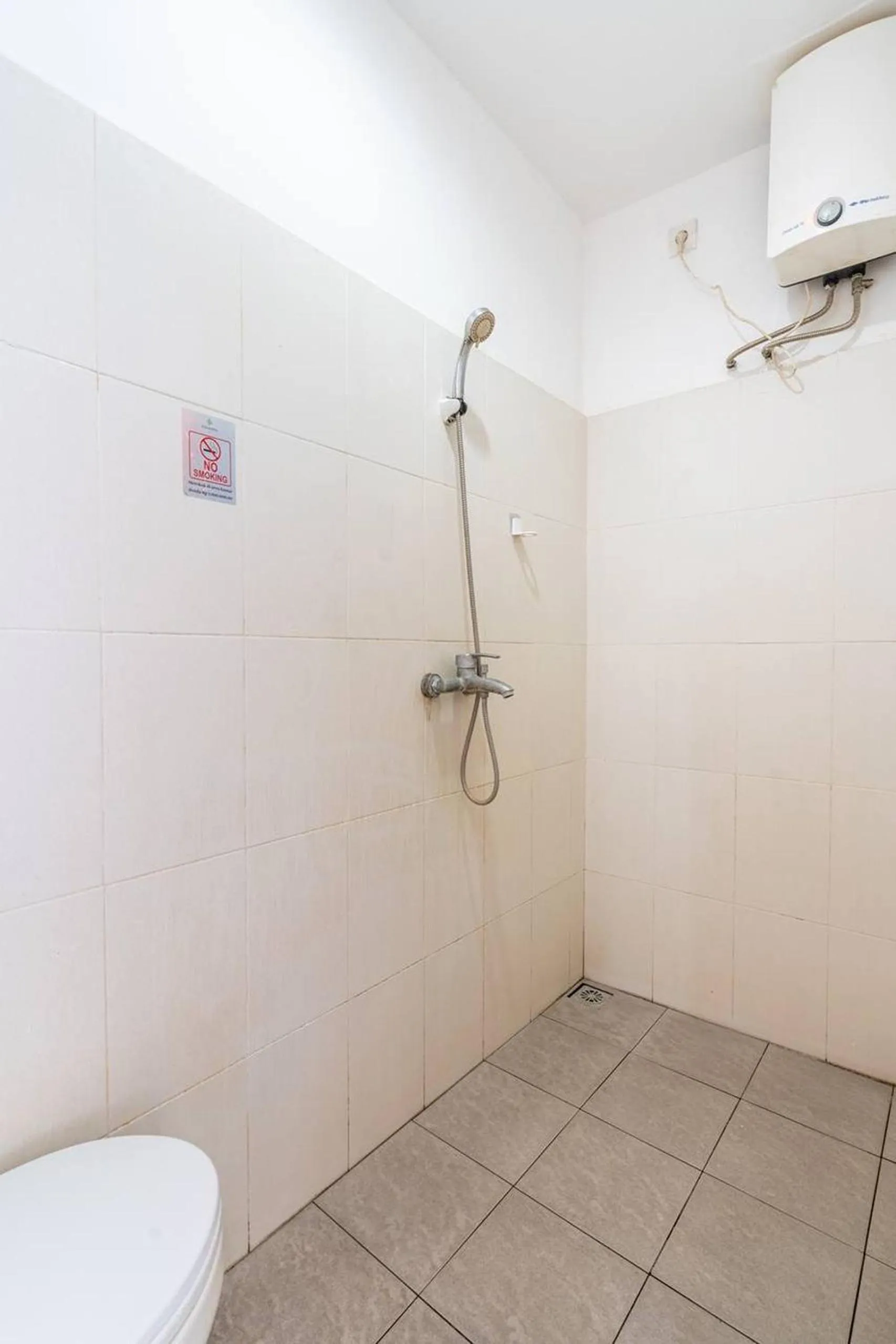 Bathroom in Ganandra Stay Denpasar