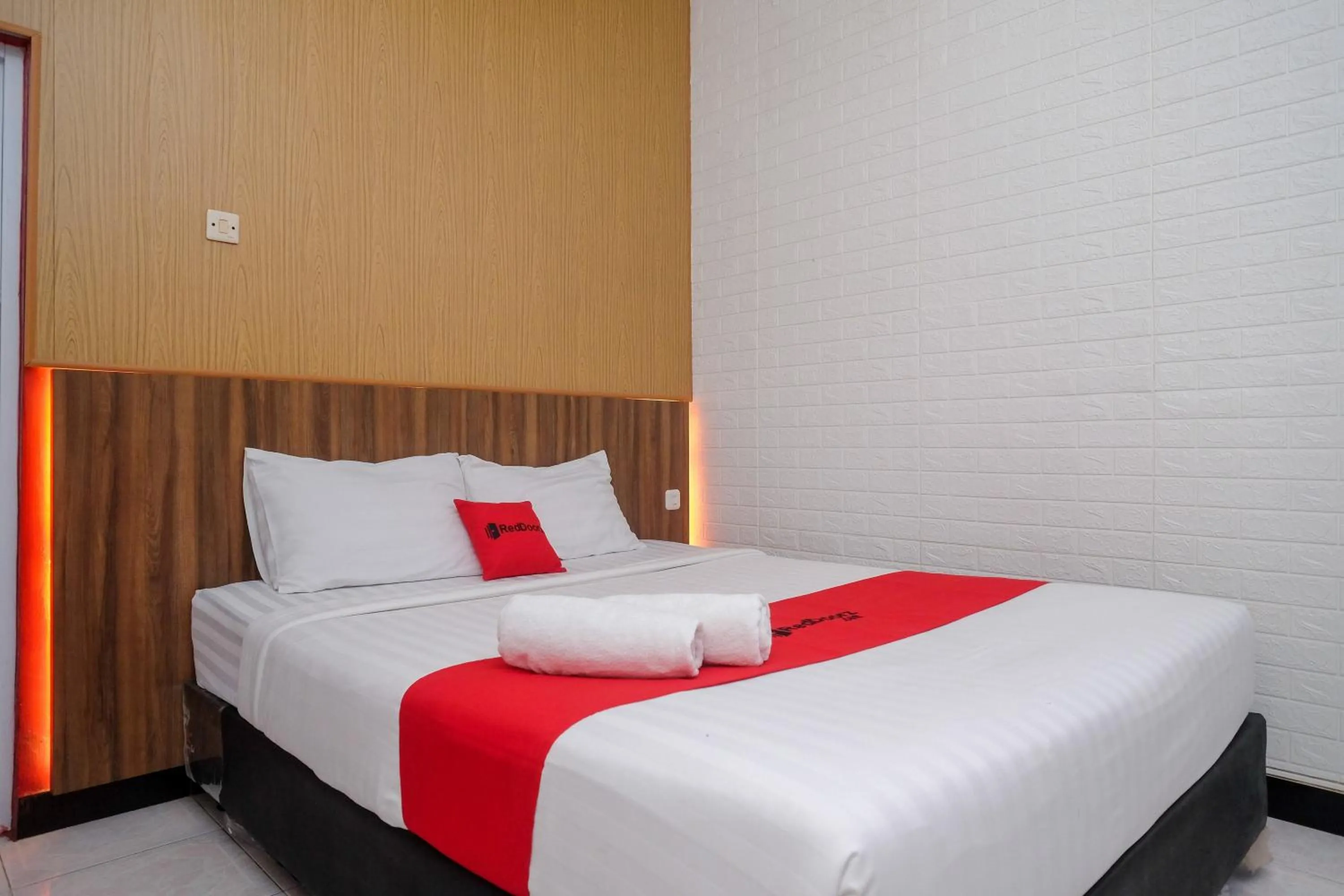 Bed in RedDoorz At Pondok Eyang Obi Sleman