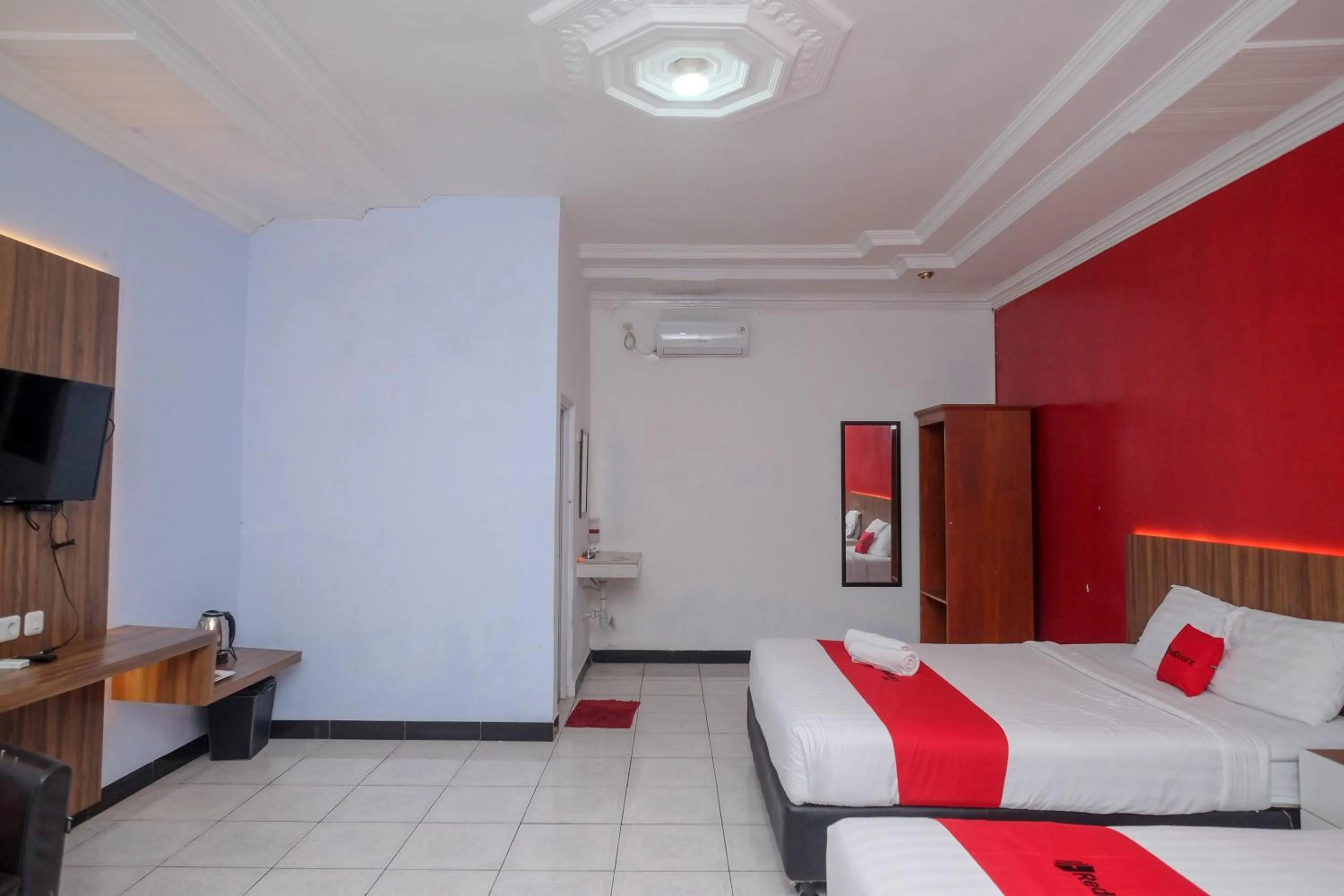 Bed in RedDoorz At Pondok Eyang Obi Sleman