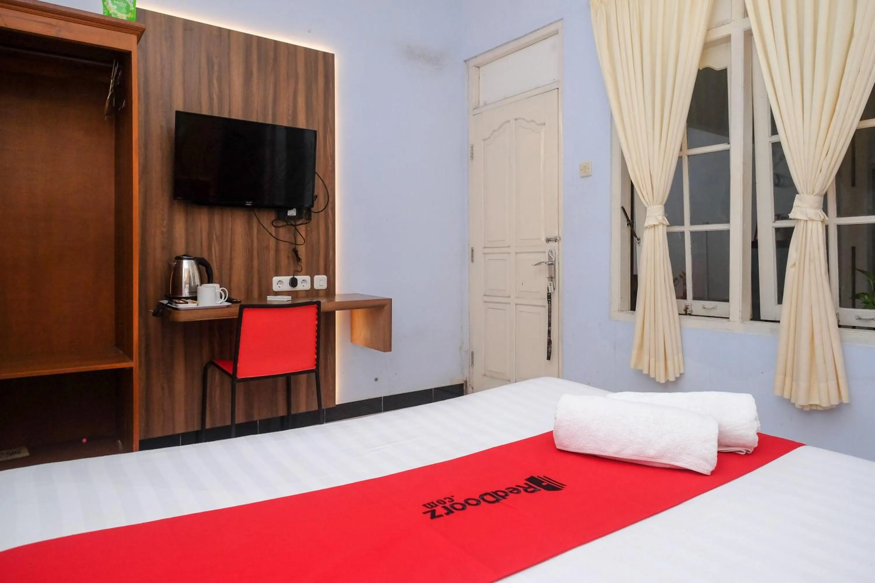 Bed in RedDoorz At Pondok Eyang Obi Sleman