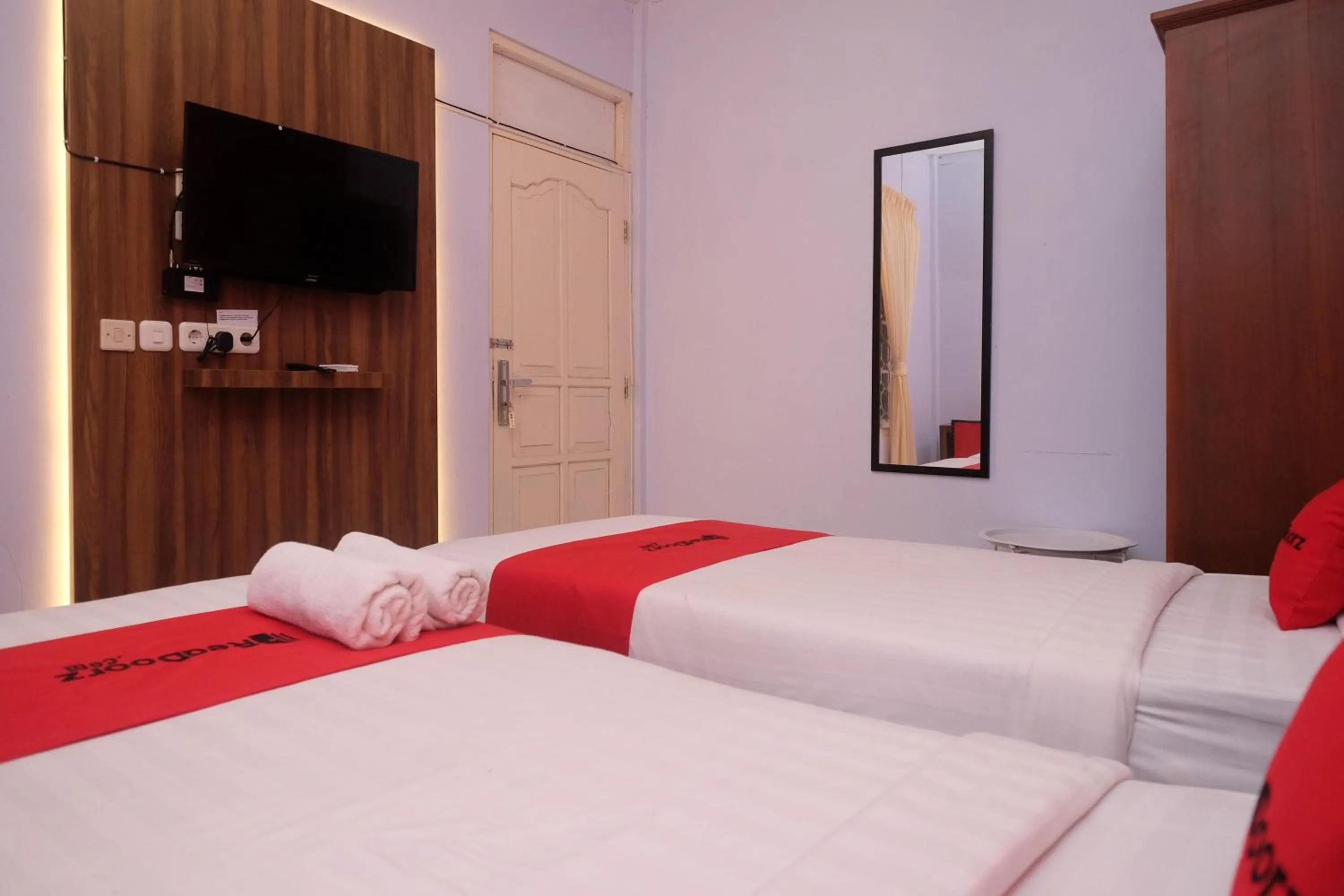 Bed in RedDoorz At Pondok Eyang Obi Sleman