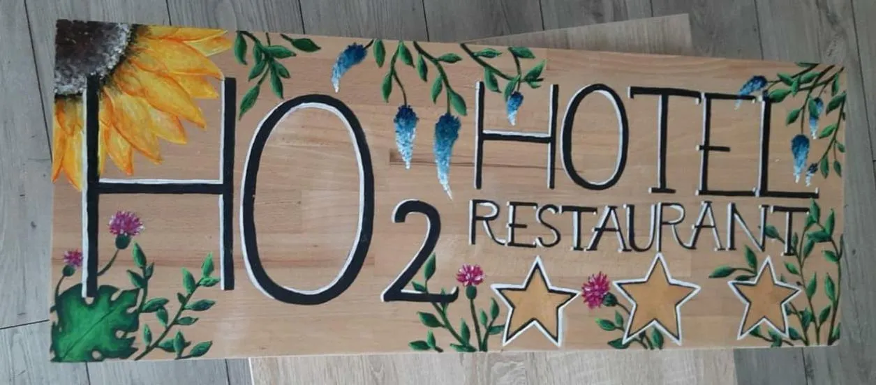 Property logo or sign in HOTEL HO2 POIANA MARULUI