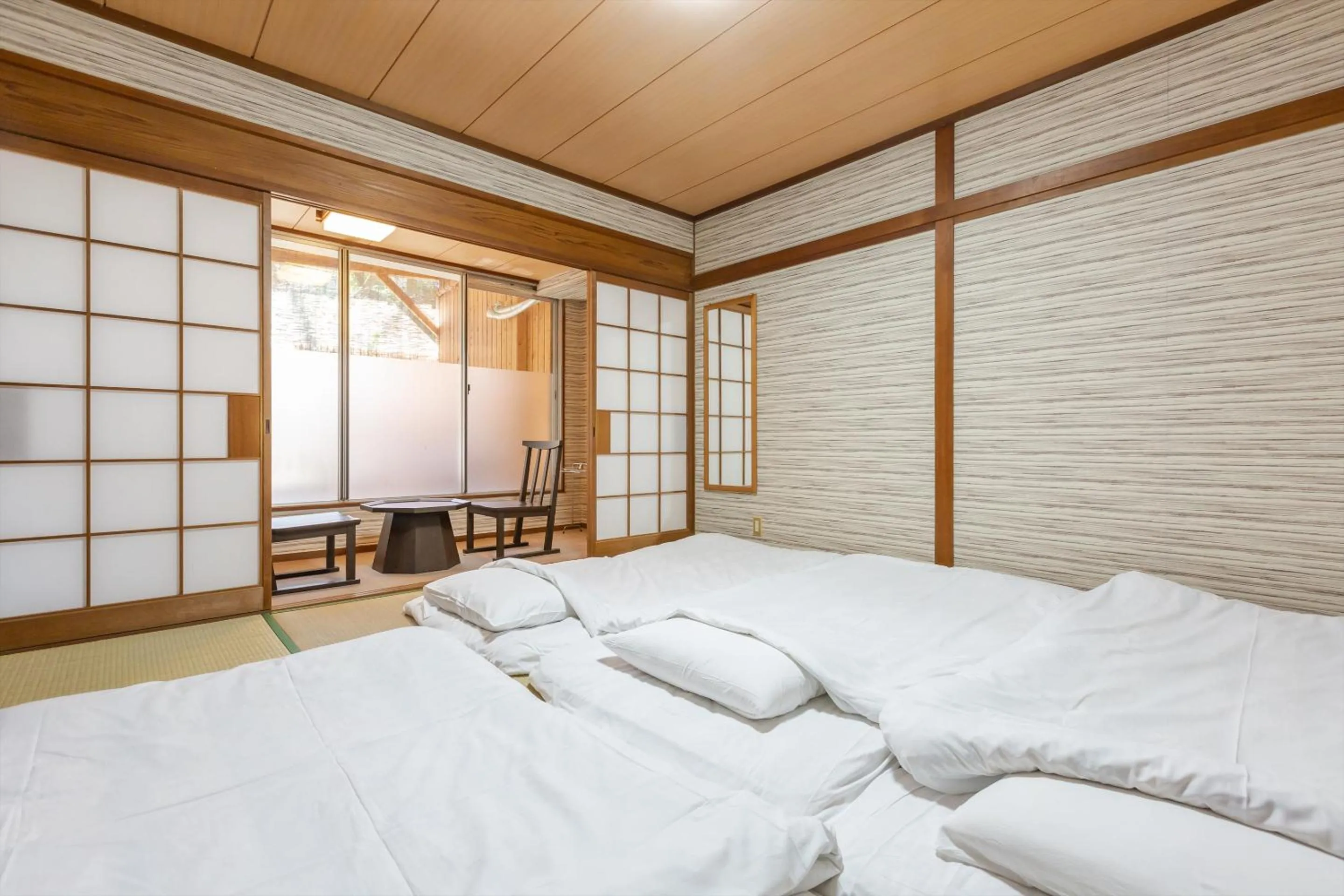 Bed in Tabist Spa Yubara Okayama Yubaraonsen