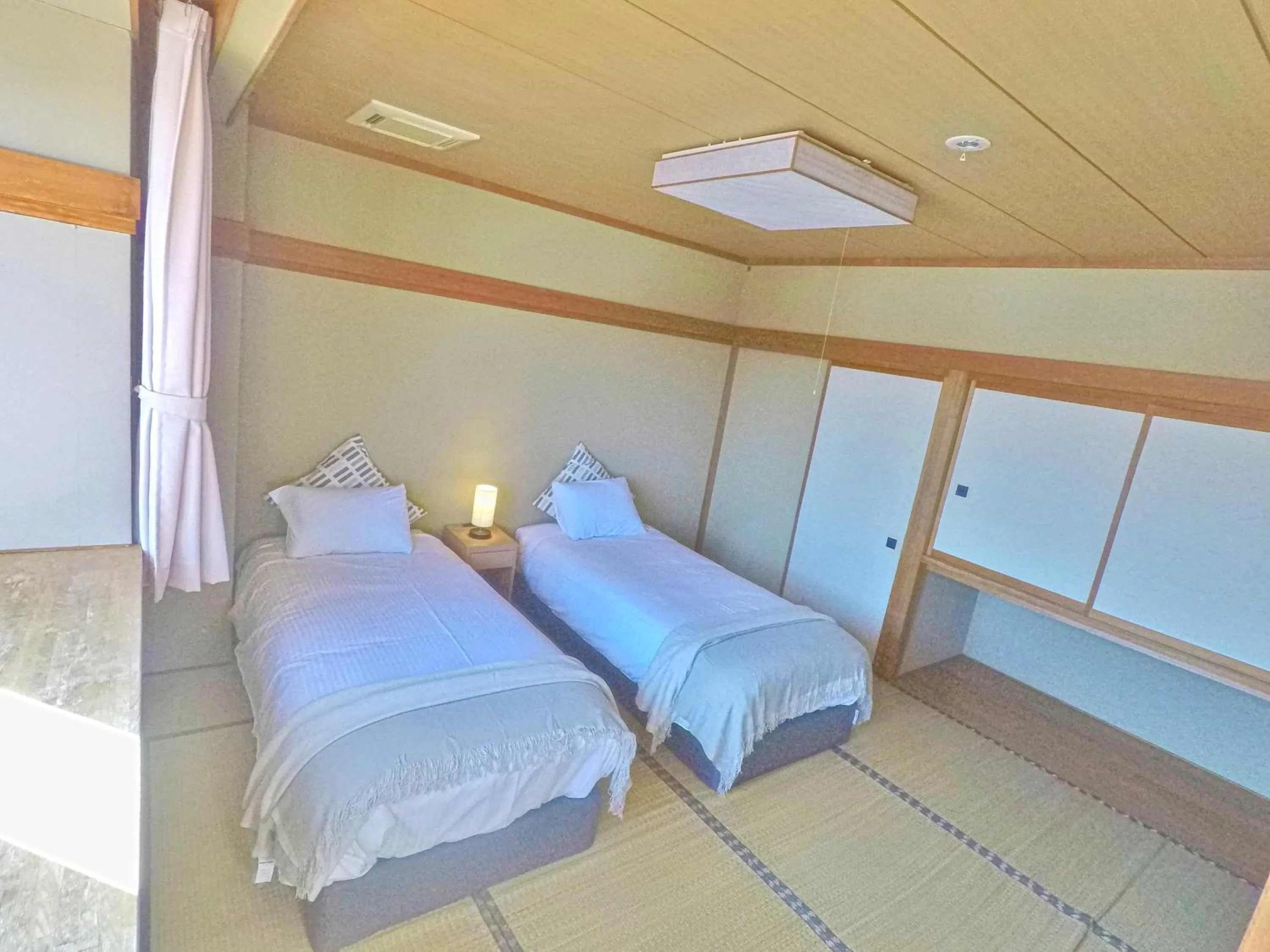 Bed in Red Fox Lodge Myoko