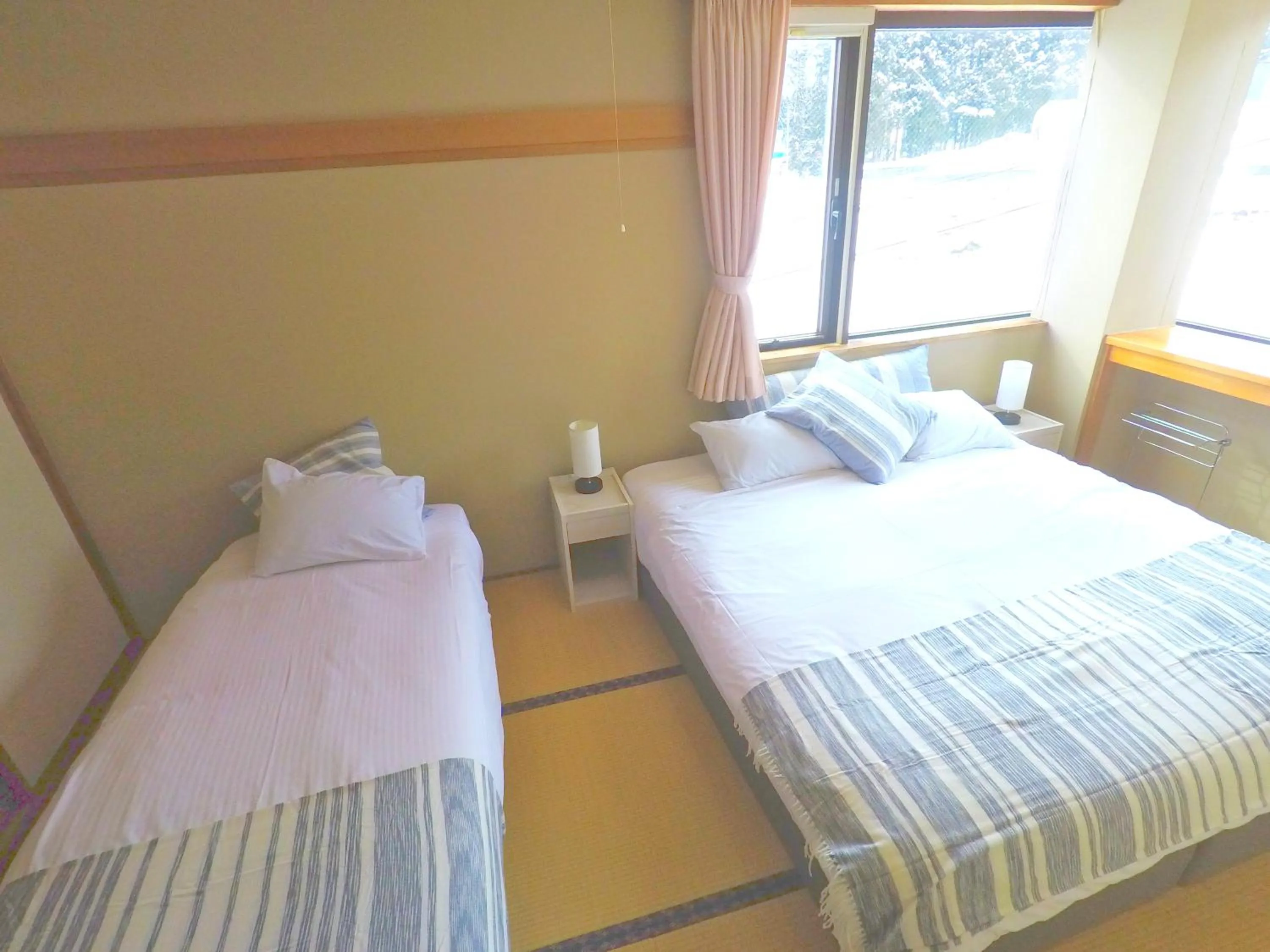 Bed in Red Fox Lodge Myoko