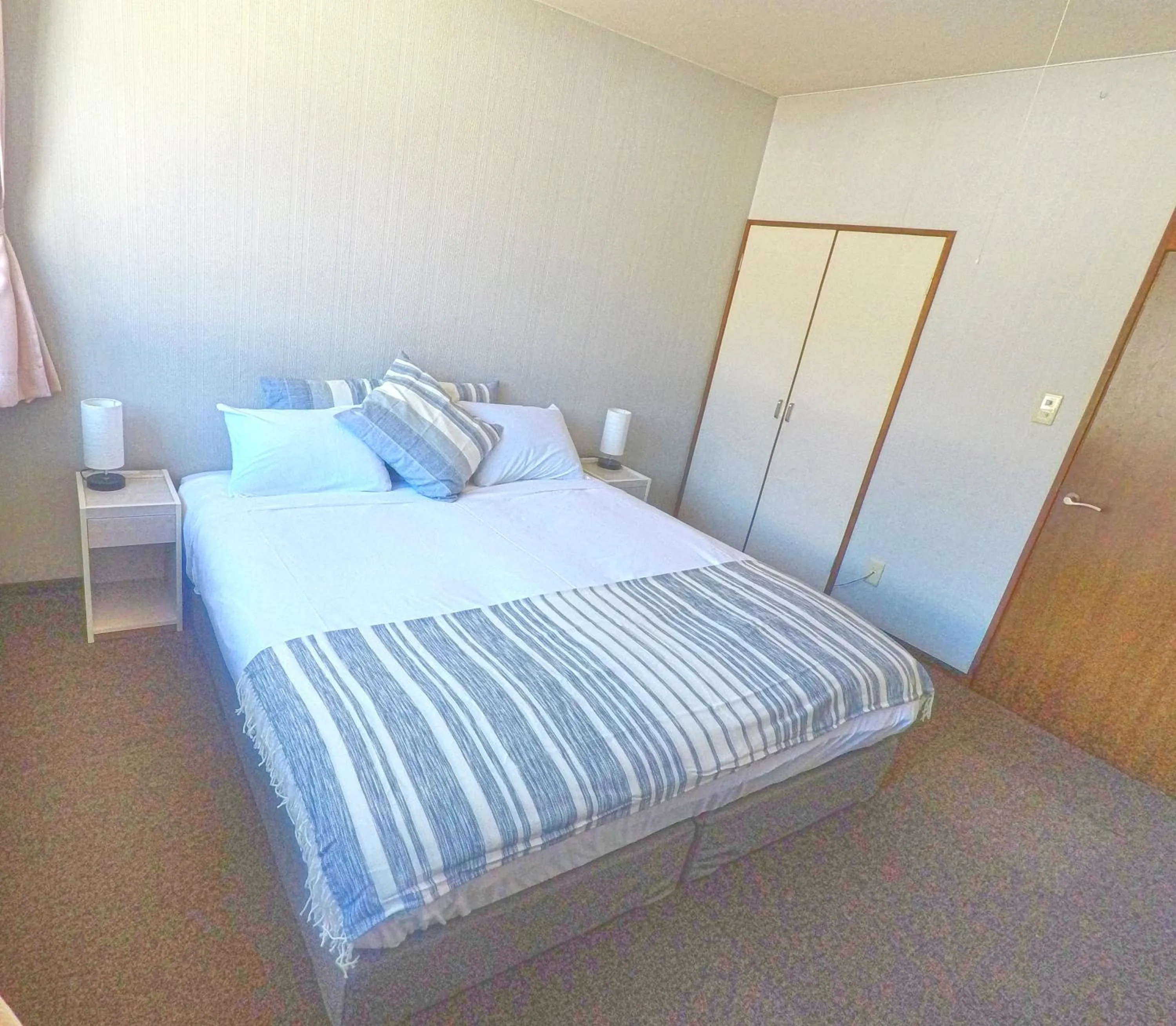 Bed in Red Fox Lodge Myoko