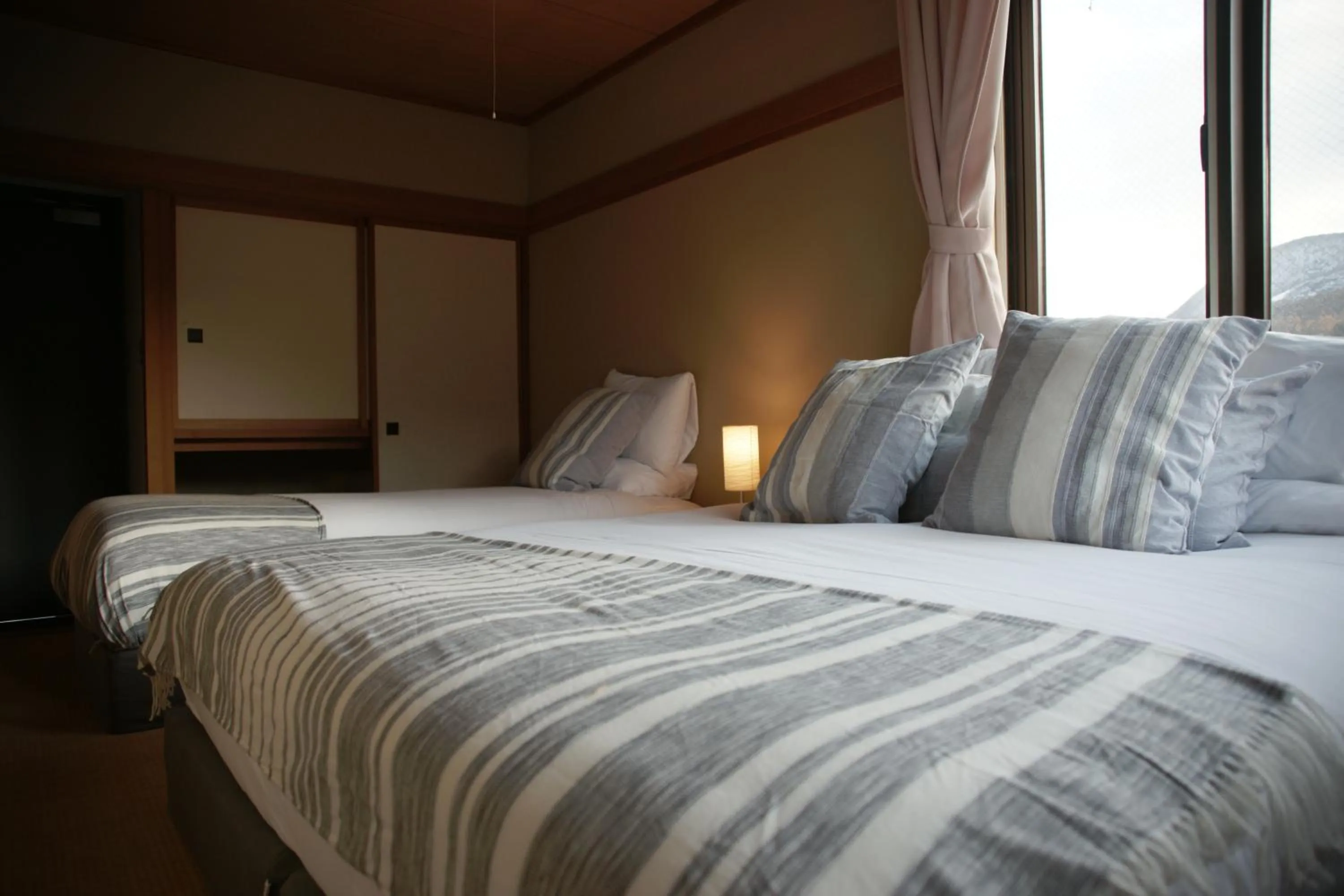 Bed in Red Fox Lodge Myoko