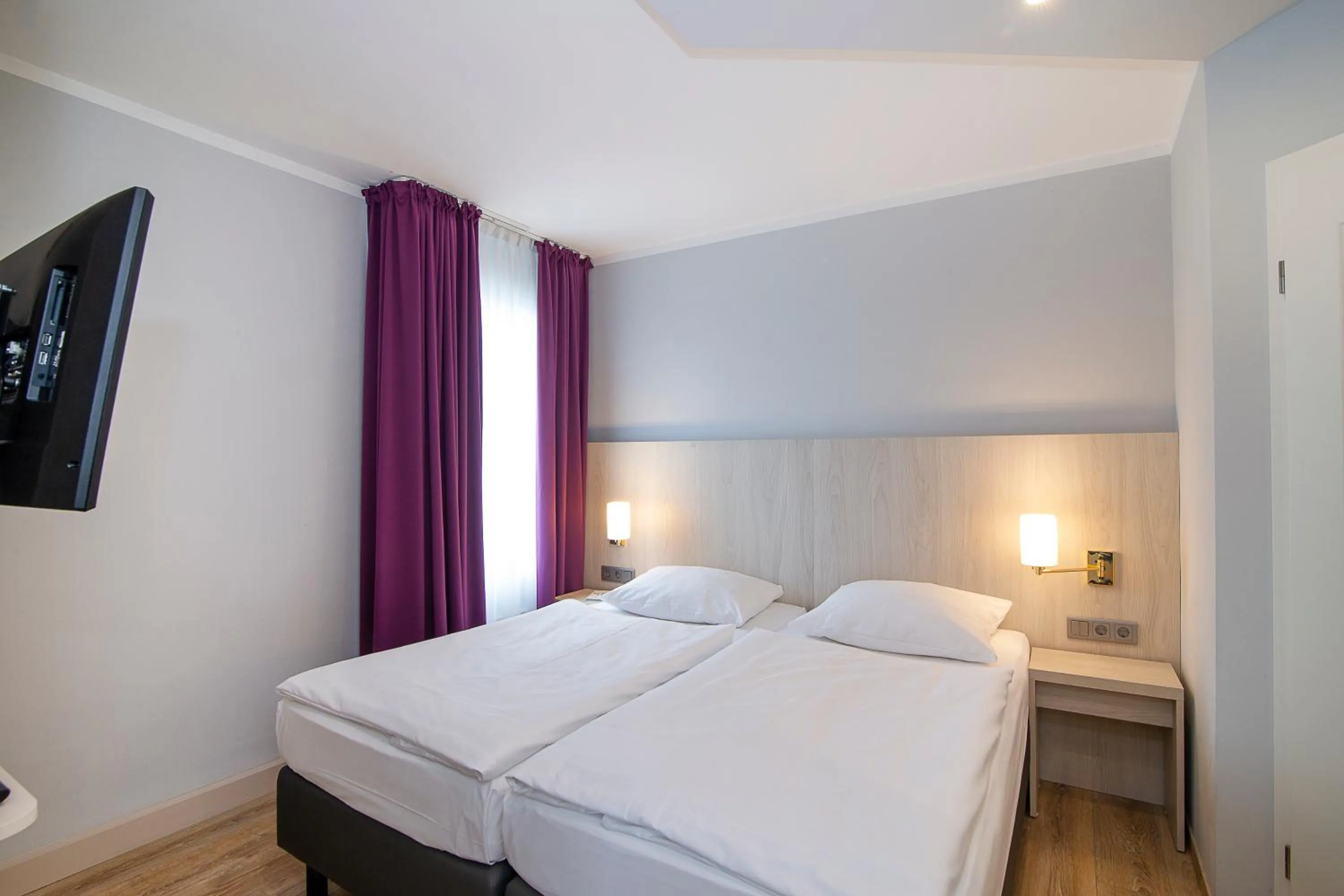 Bed in Nautic Hotel Bremerhaven