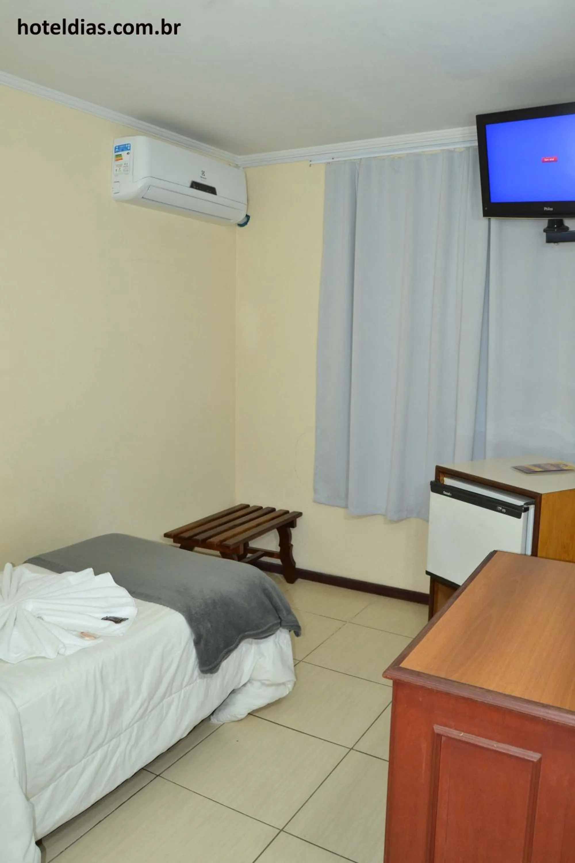 TV and multimedia, Bed in Hotel Dias em Pouso Alegre - MG - Próximo a Centros Comerciais e Restaurantes