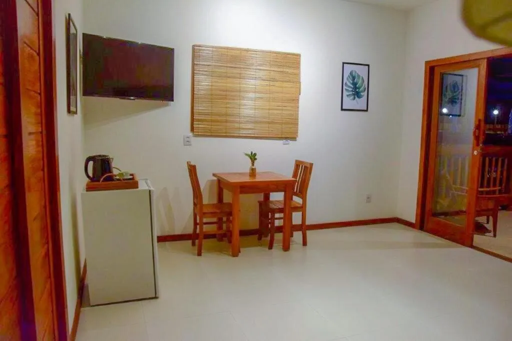 Communal lounge/ TV room in Carapitangui Pousada