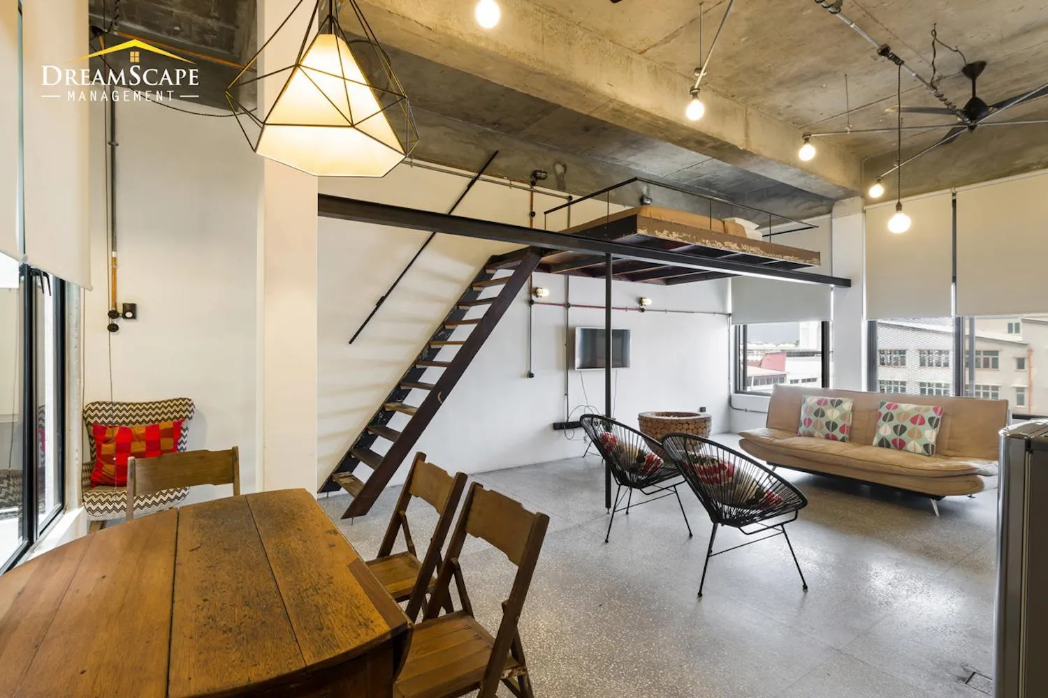 Seating area in Belakang KongHeng By DreamScape