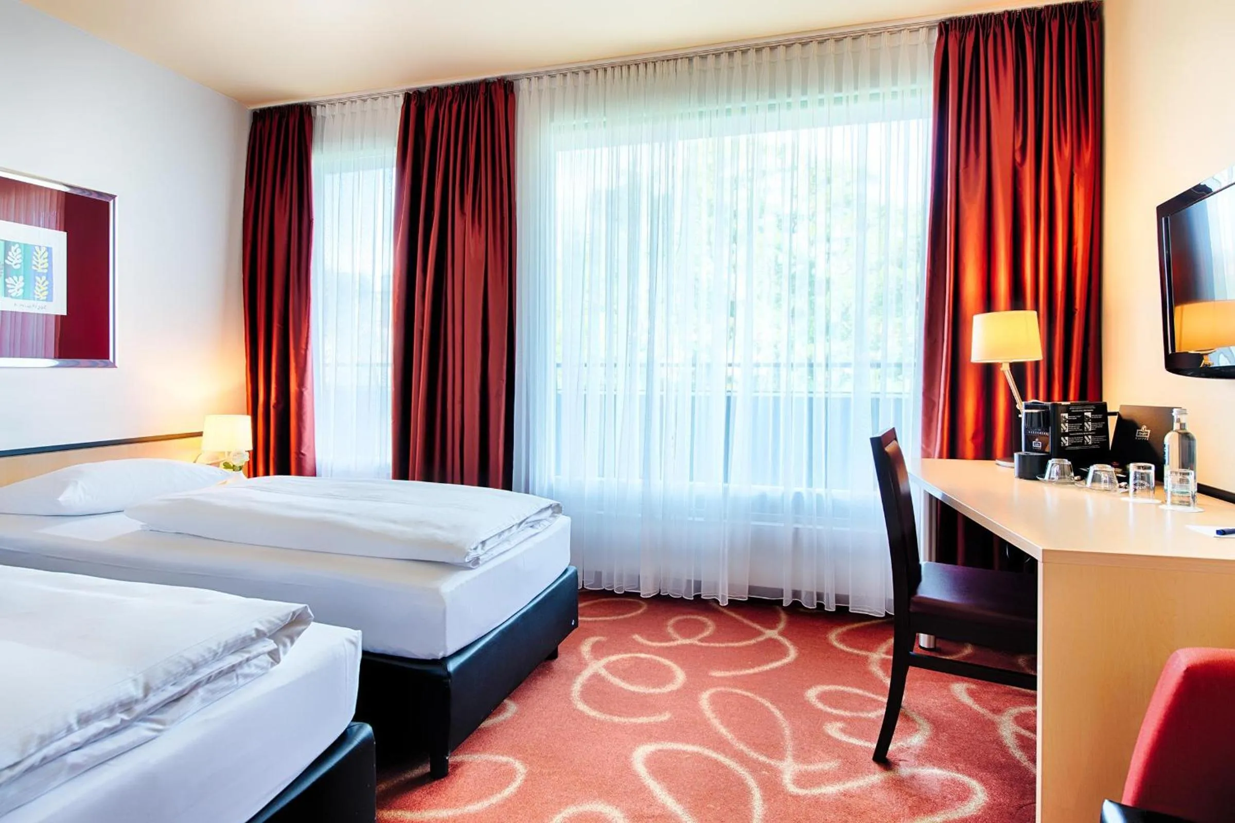 Photo of the whole room, Bed in Welcome Kongress Hotel Bamberg