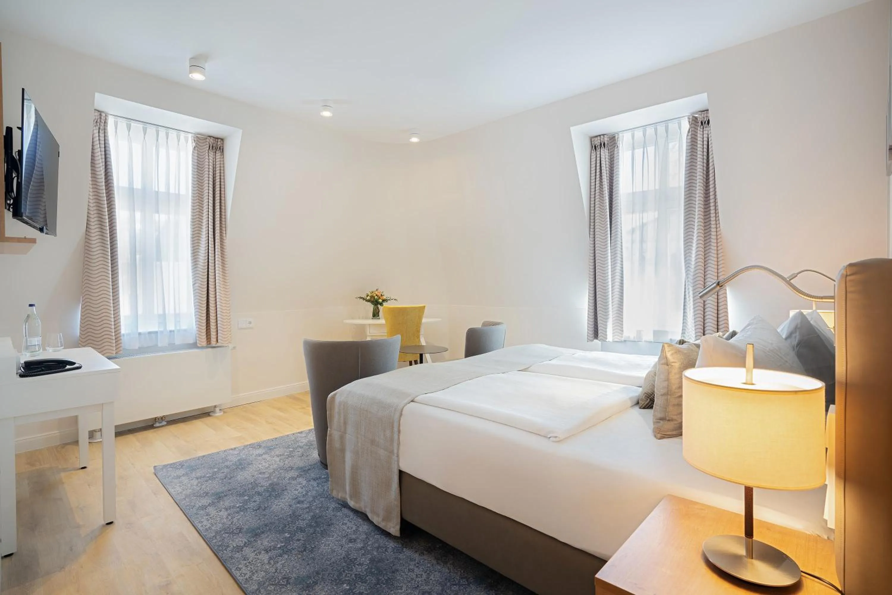 Photo of the whole room, Bed in SEETELHOTEL Ostseehotel das Entdeckerhotel an der Ostsee und der perfekte Startpunkt für Ihre Inselabenteuer