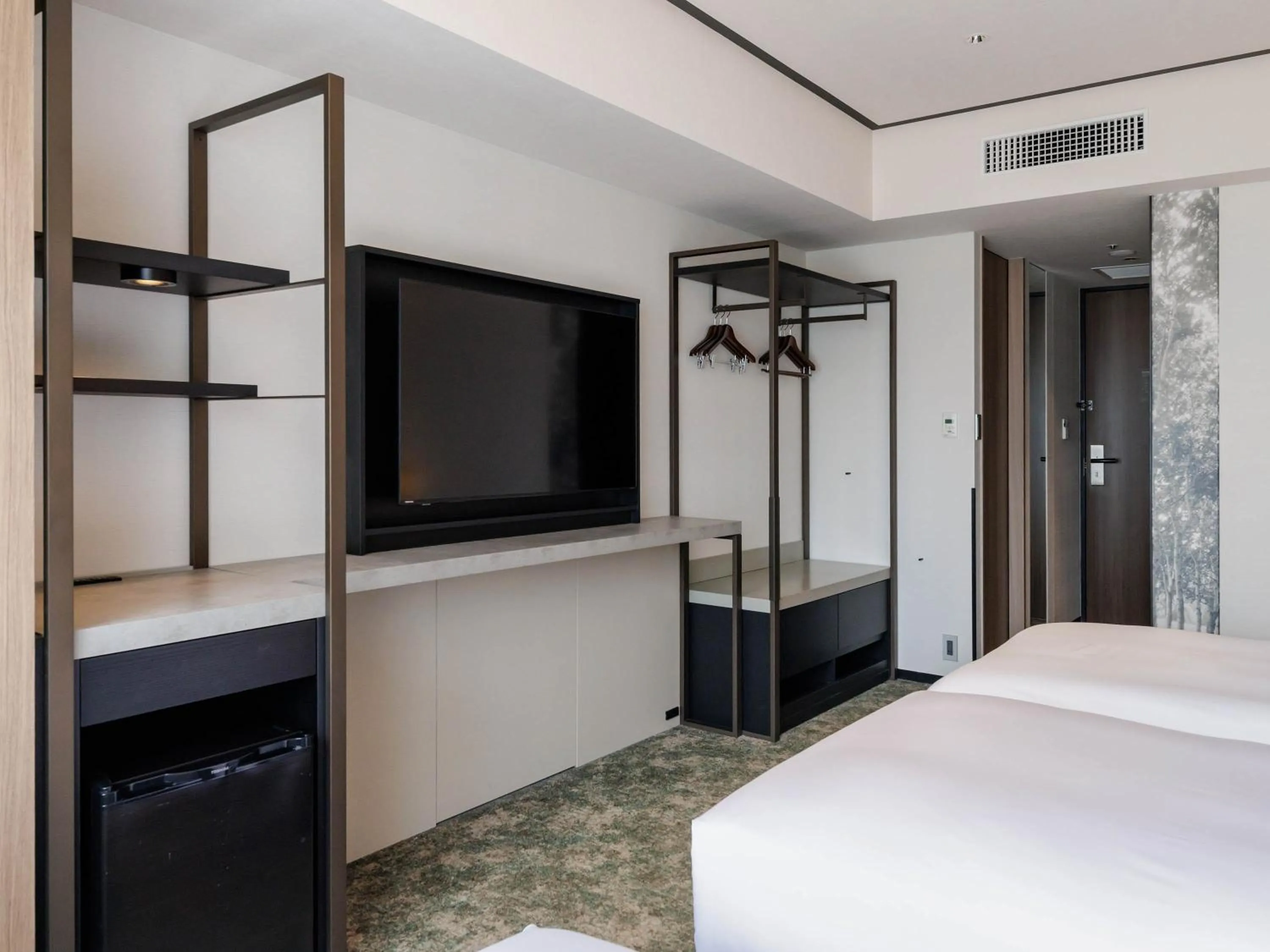 Photo of the whole room, Bed in Solaria Nishitetsu Hotel Sapporo