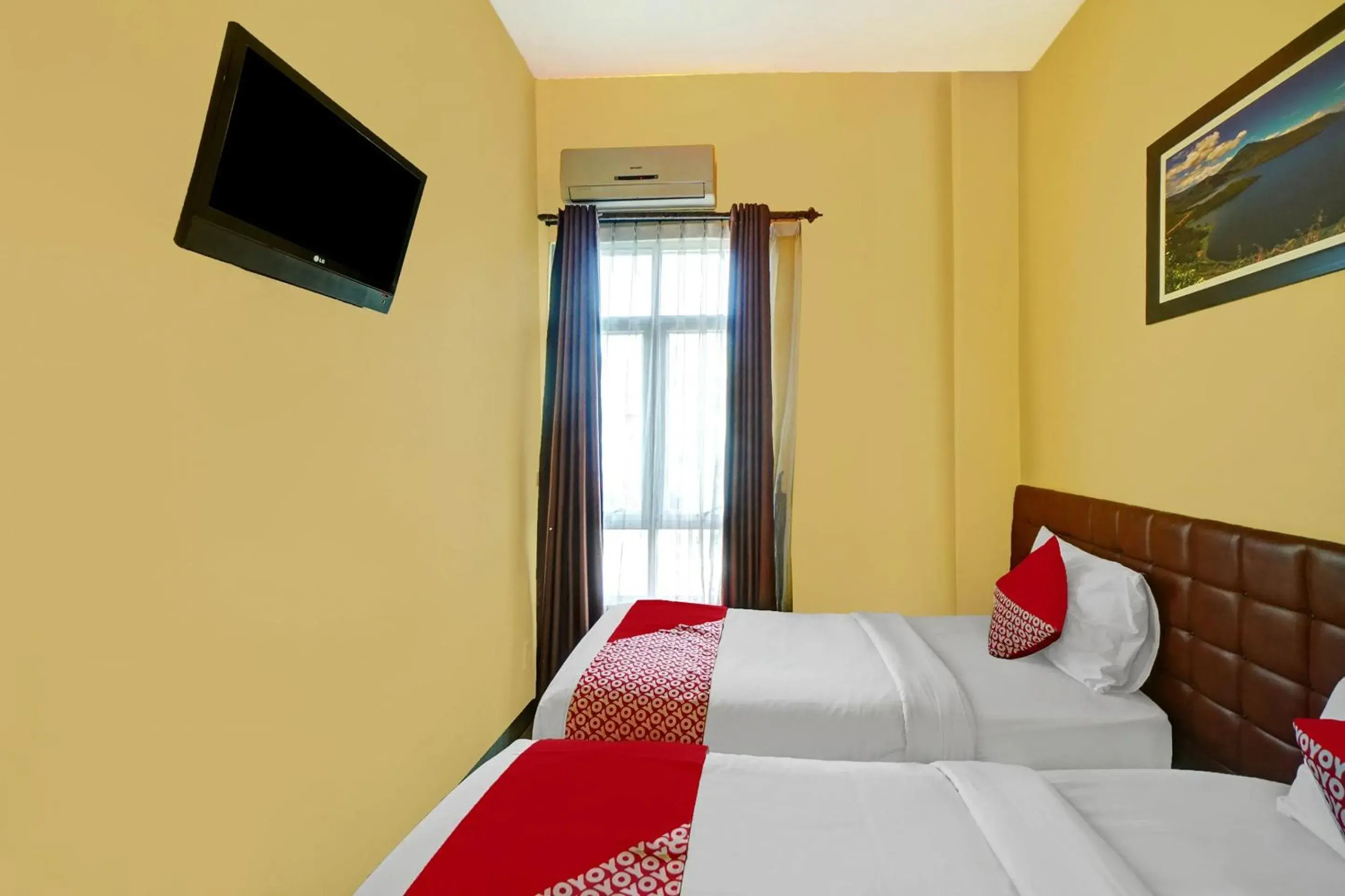 Economy Twin Room in Hotel O Wesly House Economy Twin Room in Hotel O Wesly House