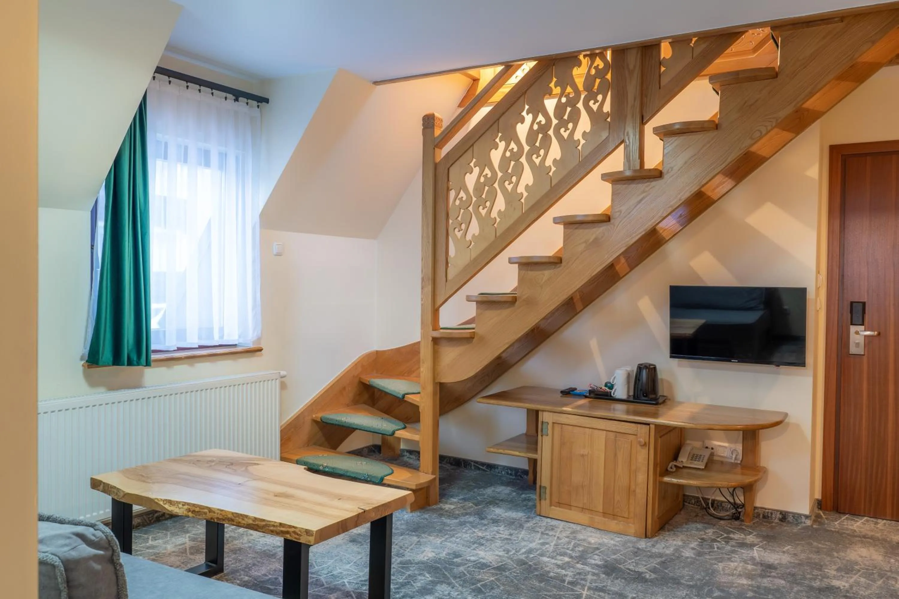 Communal lounge/ TV room in Willa Monte Rosa