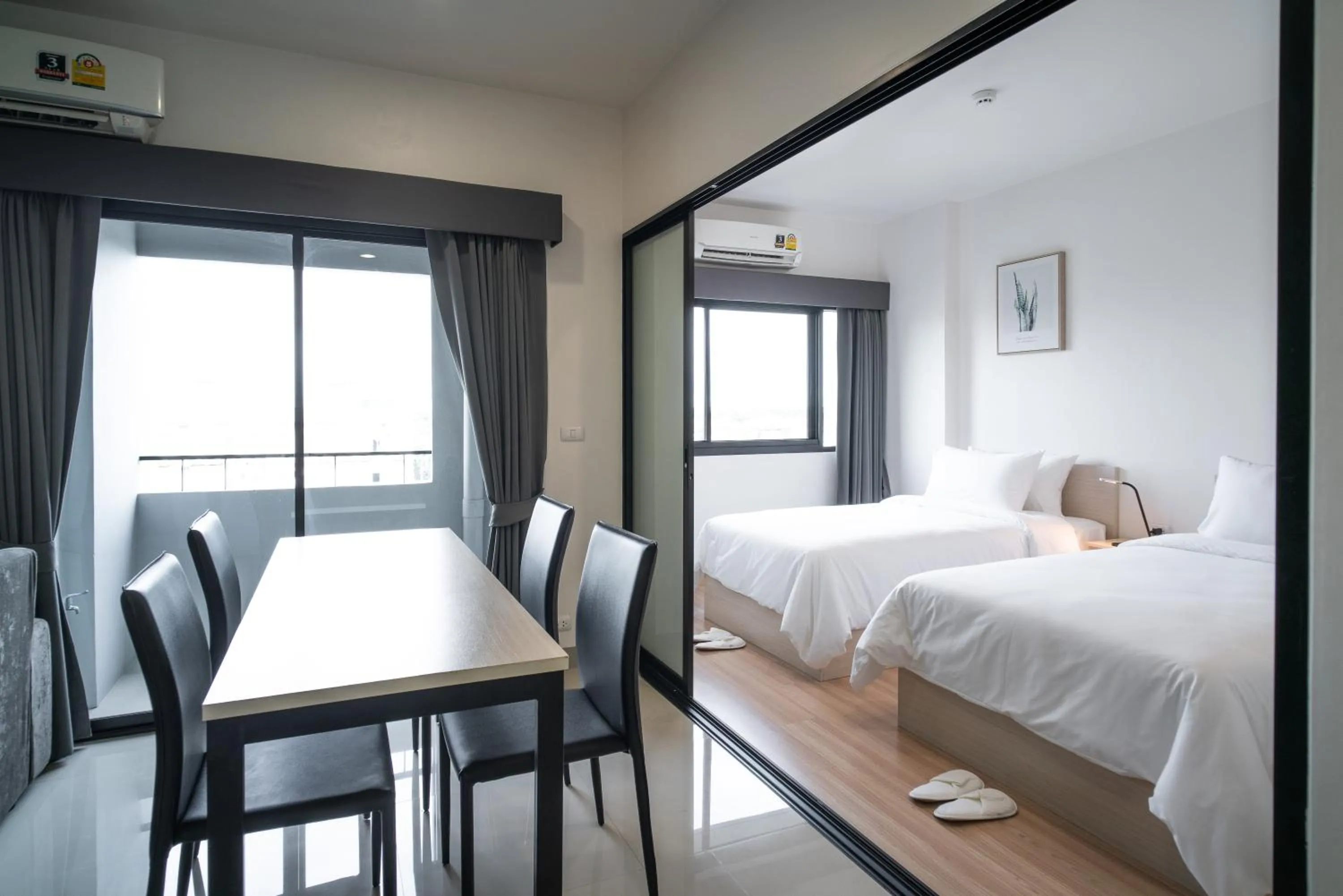 Photo of the whole room, Bed in KOS Hotel Suvarnabhumi Airport -SHA Extra Plus