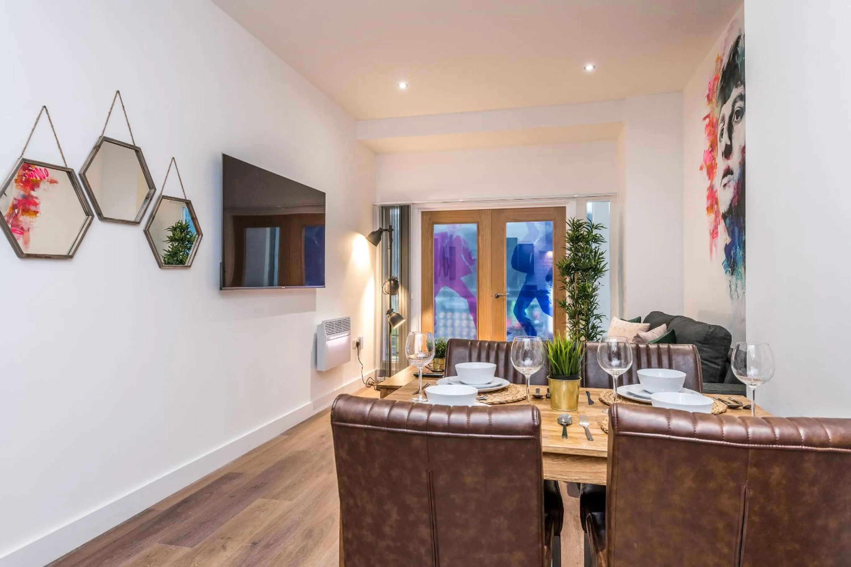 Living room in SGT Peppers Mathew Street Apartments By Happy Days