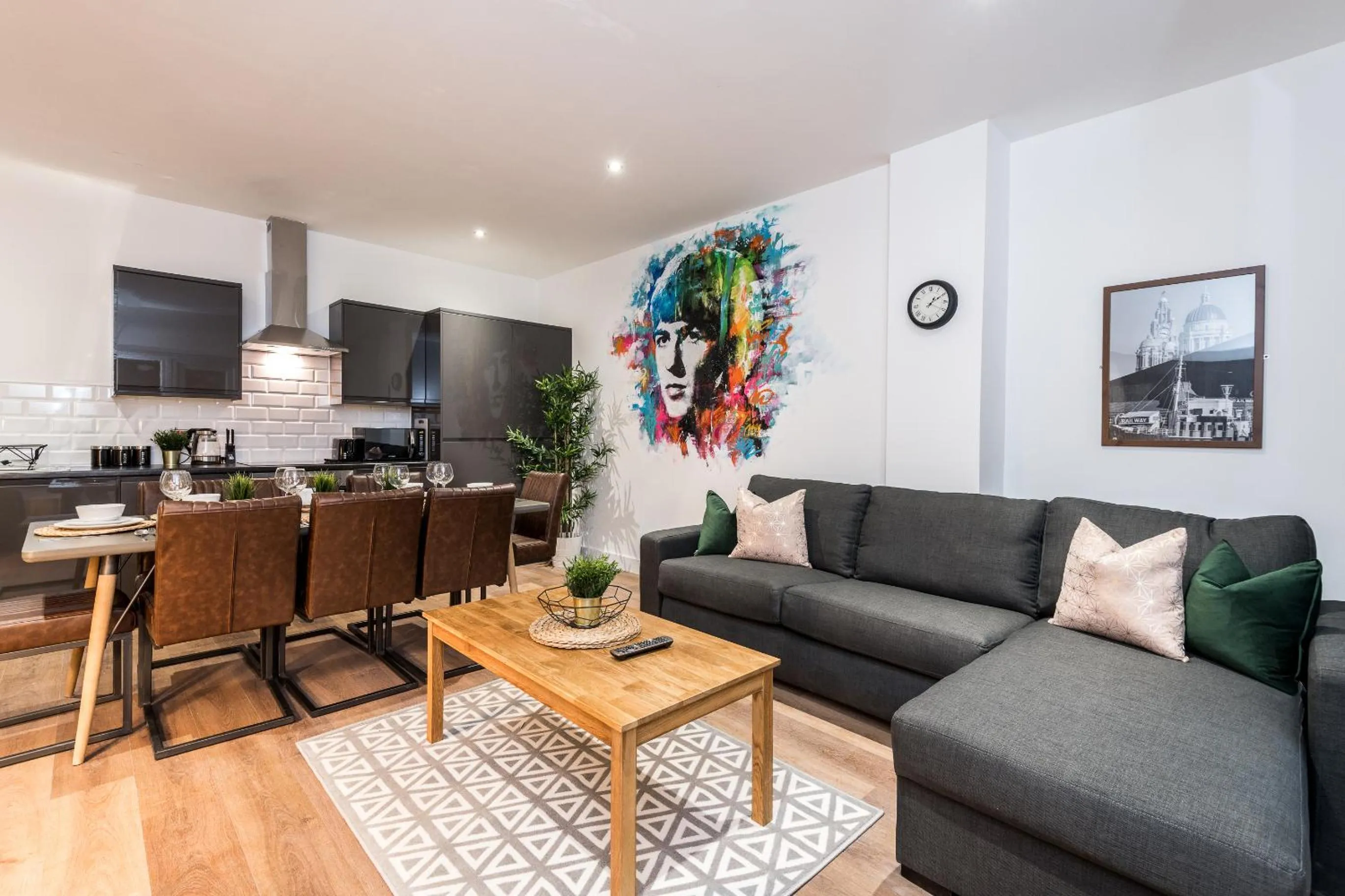 Living room in SGT Peppers Mathew Street Apartments By Happy Days