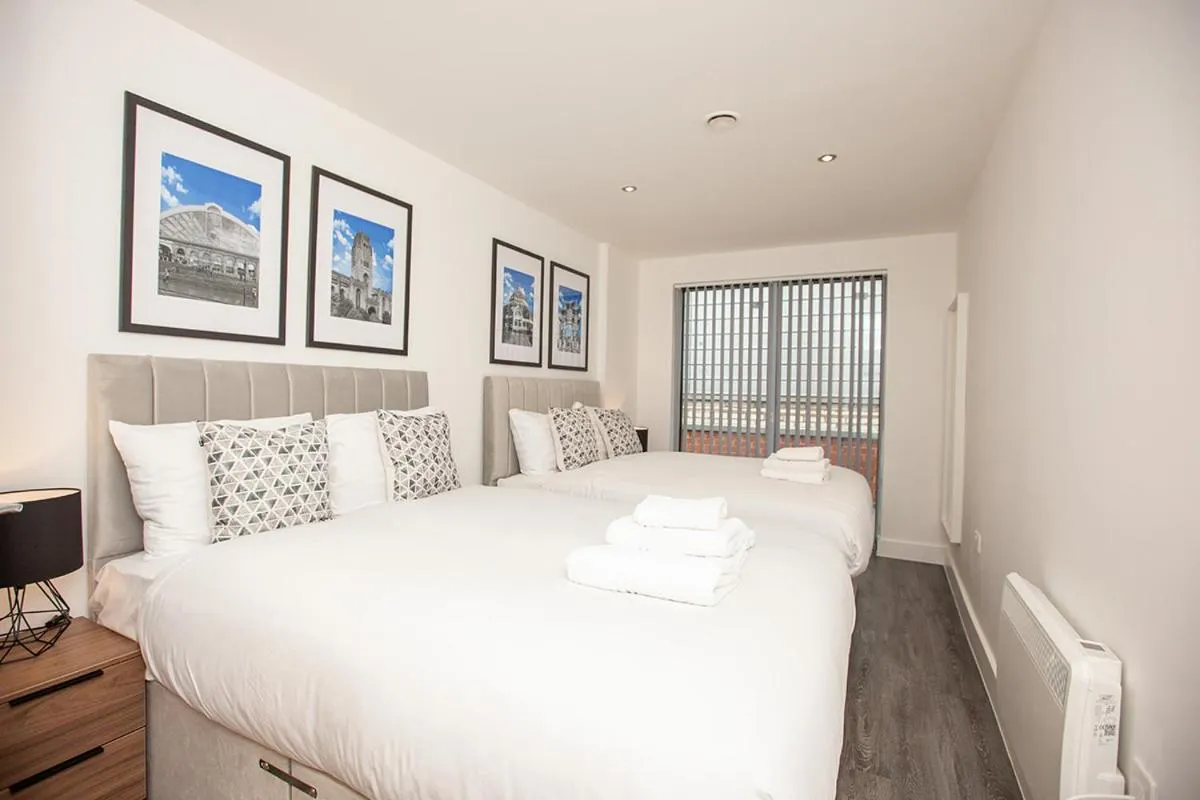 Bed in SGT Peppers Mathew Street Apartments By Happy Days