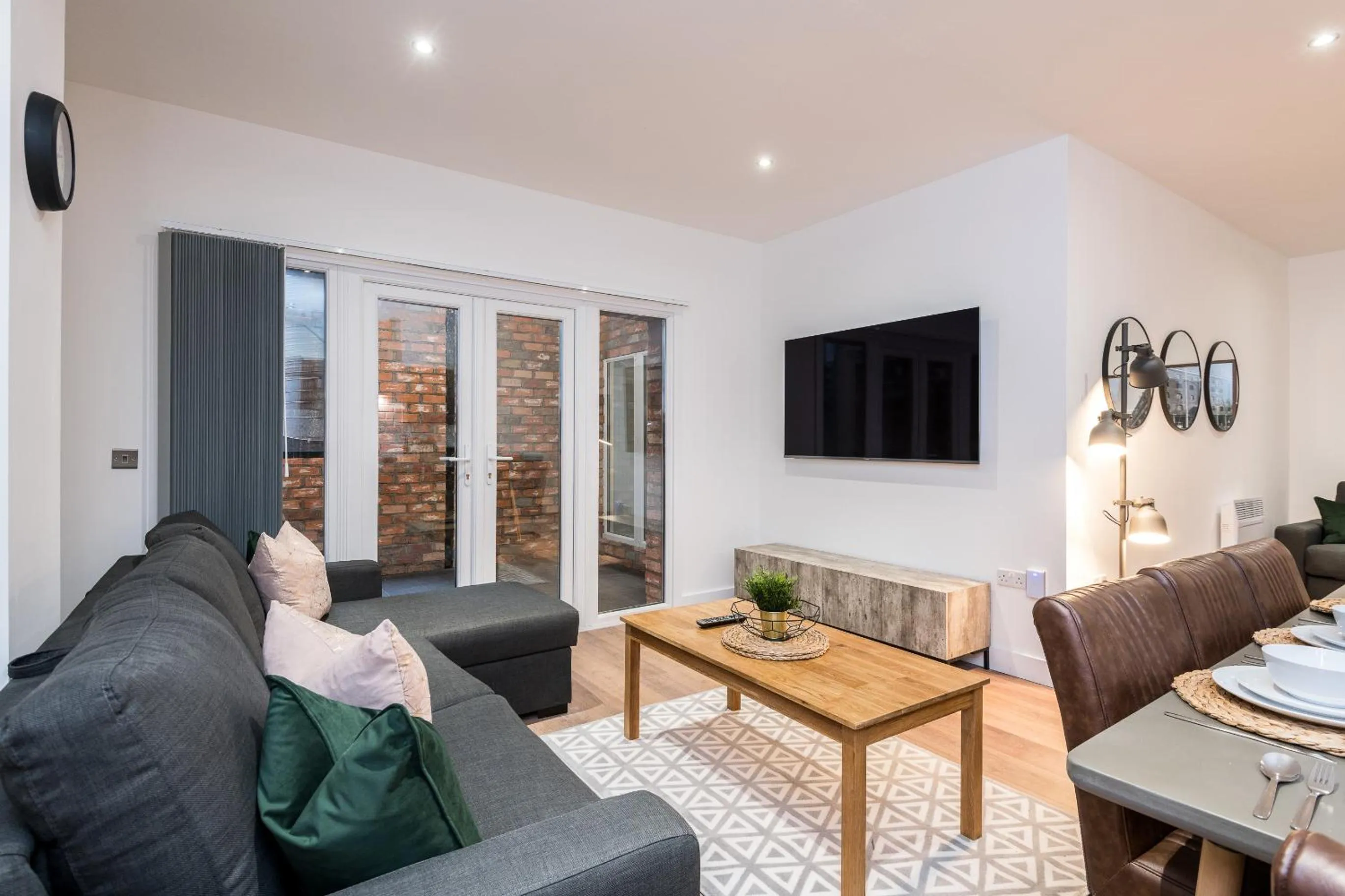 Living room in SGT Peppers Mathew Street Apartments By Happy Days