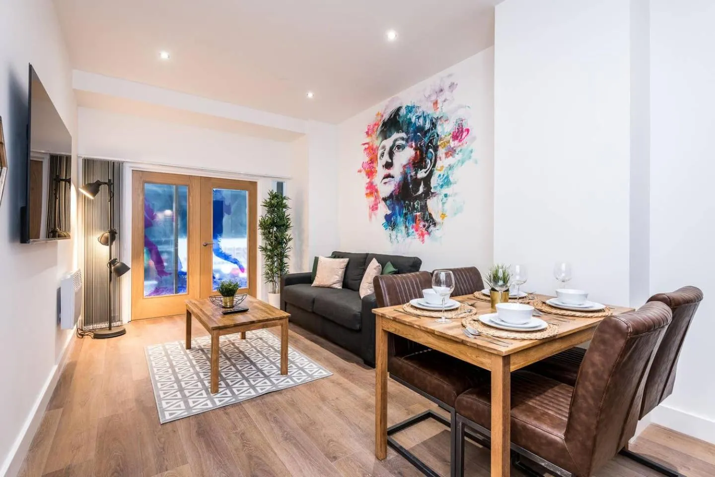 Living room in SGT Peppers Mathew Street Apartments By Happy Days